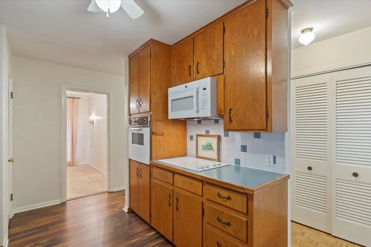 Kitchen with electric cooktop, oven and microwave