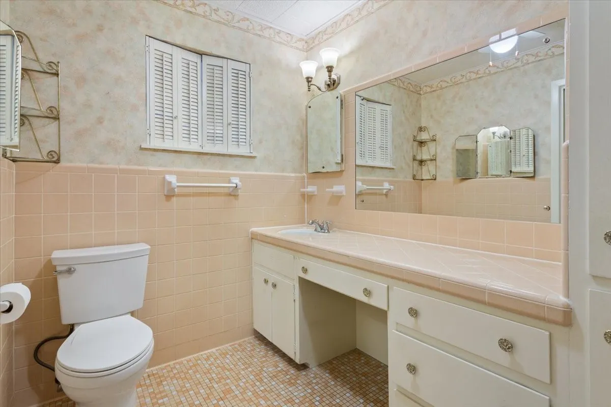 Primary vanity with original tile