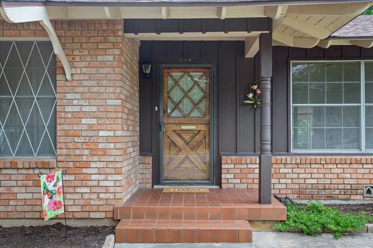 Dutch style front door with both bottom and top half open and lock
