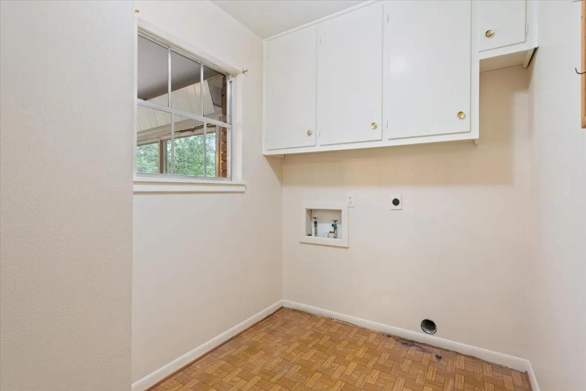 Laundry room with space for full size washer and dryer