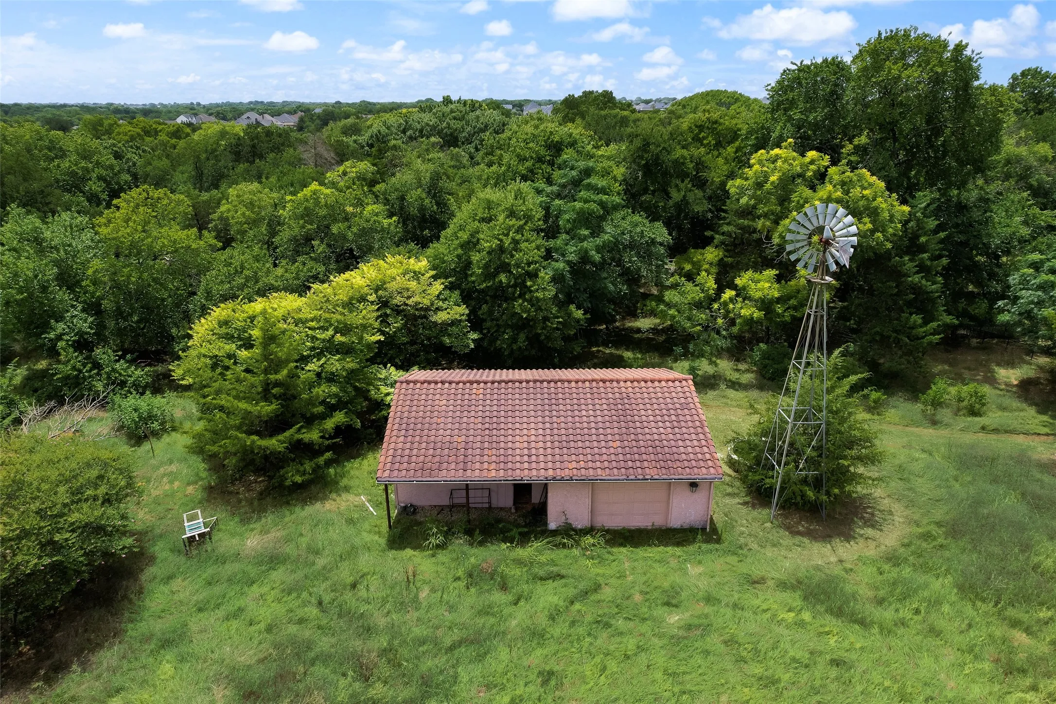 Detached garage, office, chicken coop and barn area