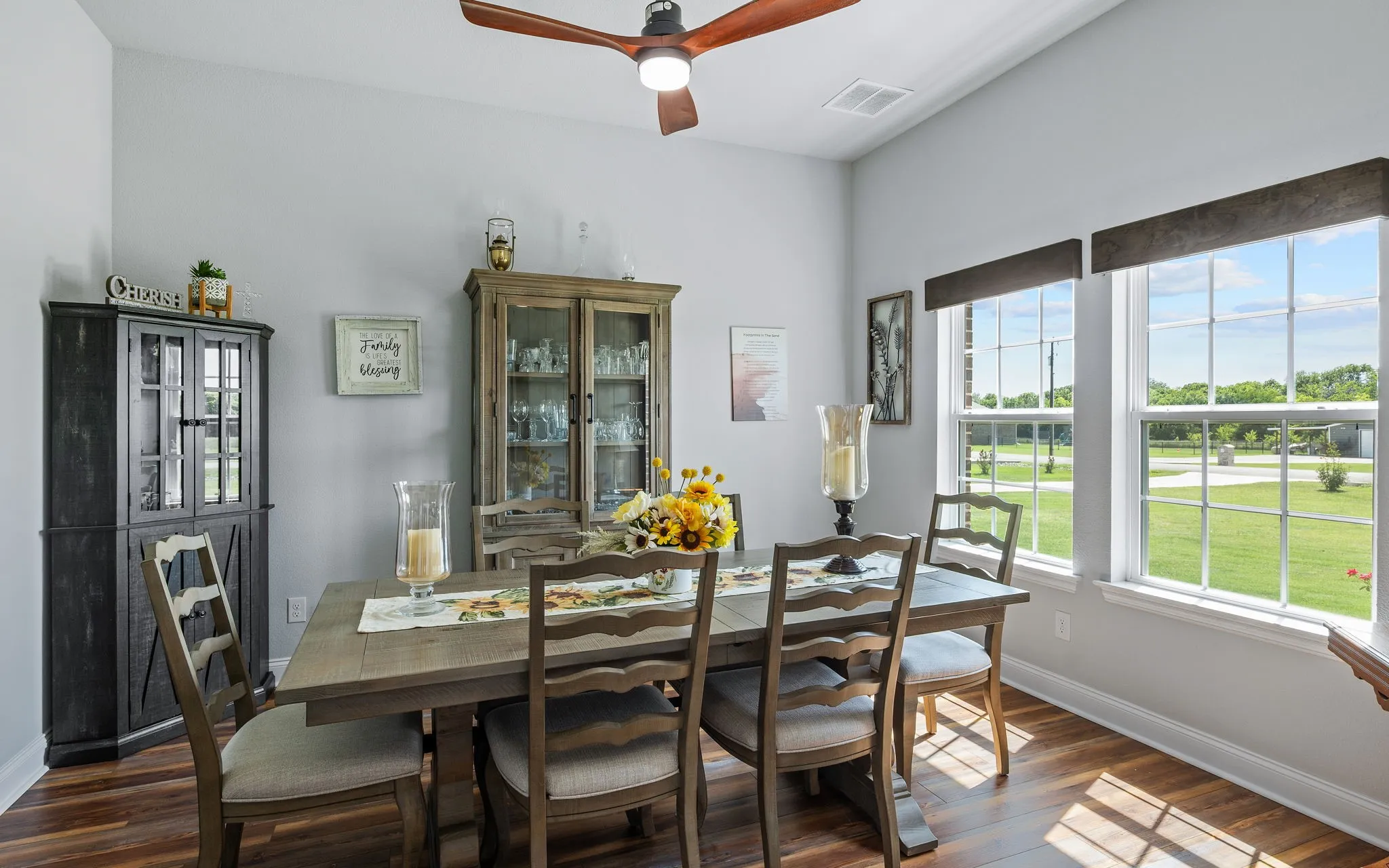 Spacious dining area featuring gorgeous view of front lawn