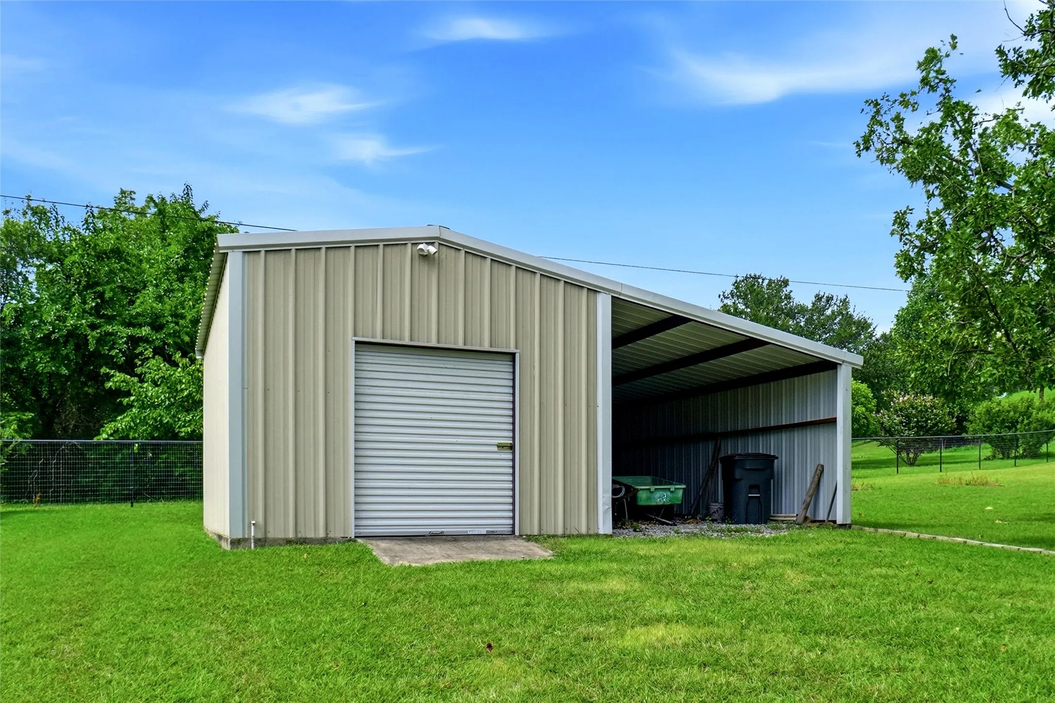 24x14 workshop with electric plus tractor storage
