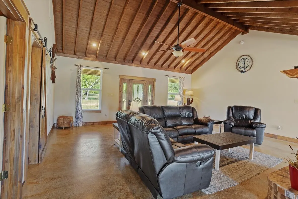 Vaulted wood-plank ceiling with exposed beams