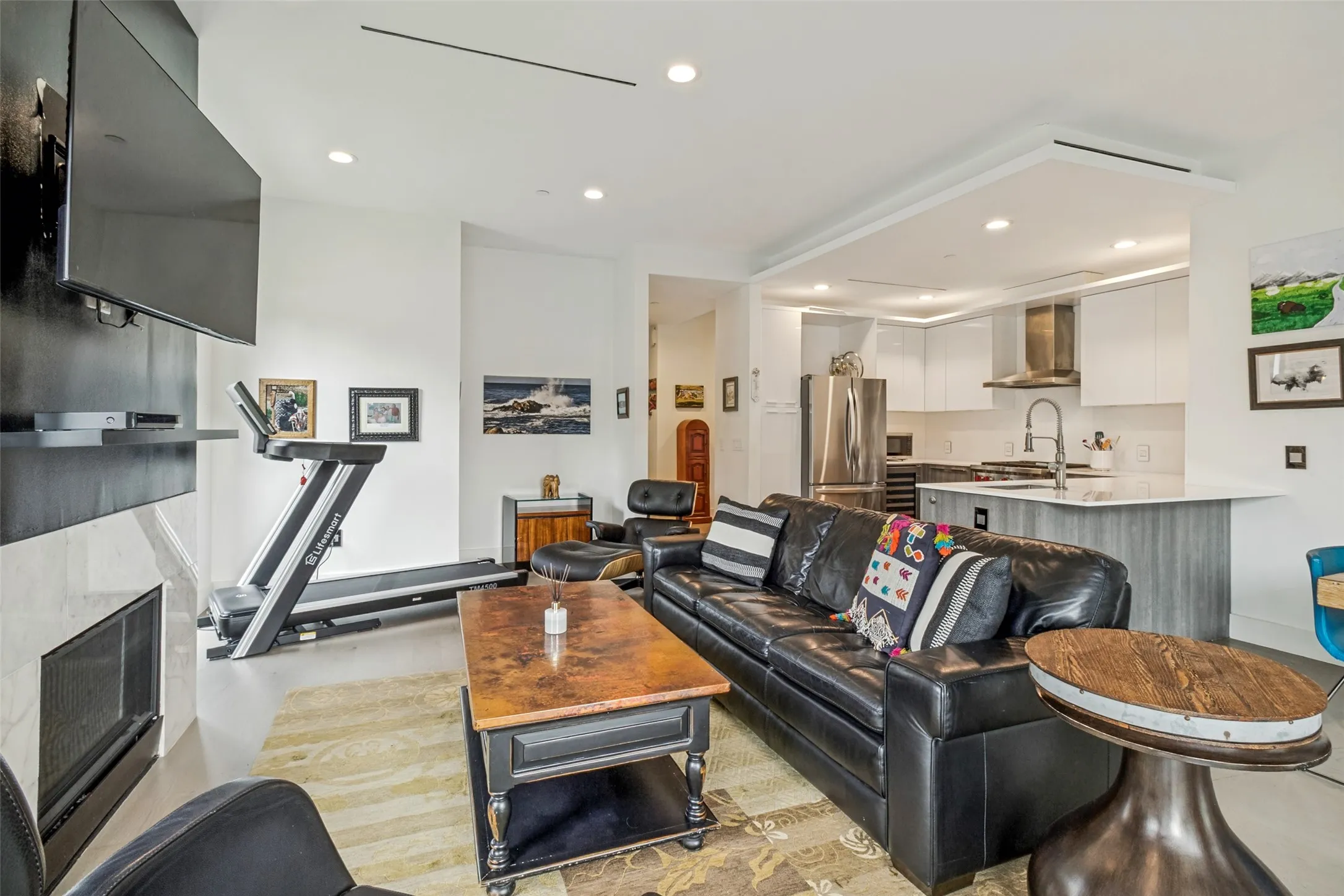 Open-concept living space featuring a modern kitchen
