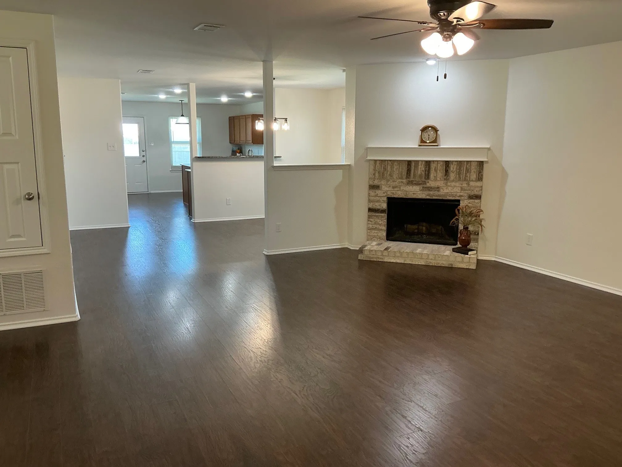 Open living with easy flow between living, dining, and kitchen.