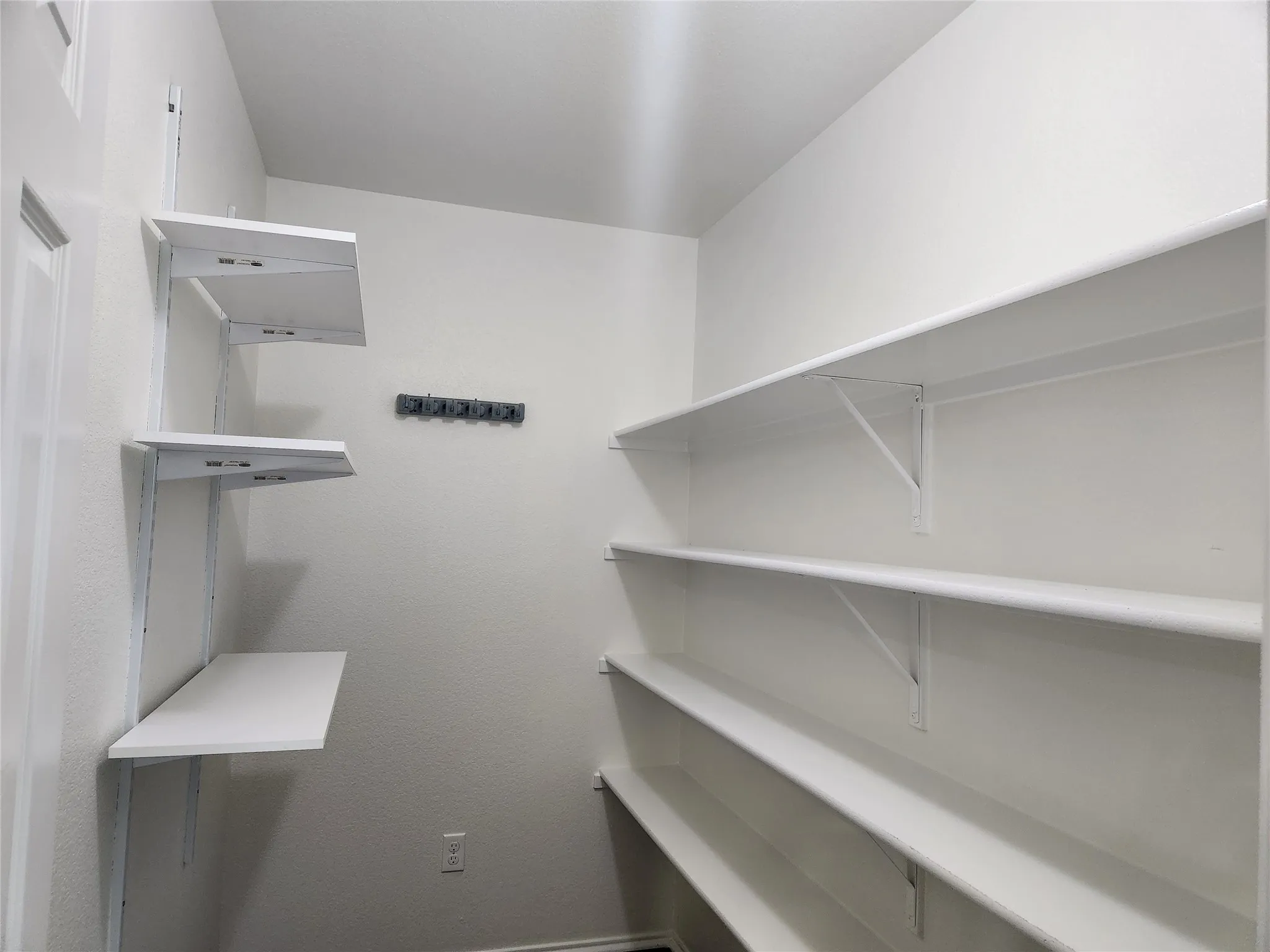 Over sized walk-in pantry in kitchen