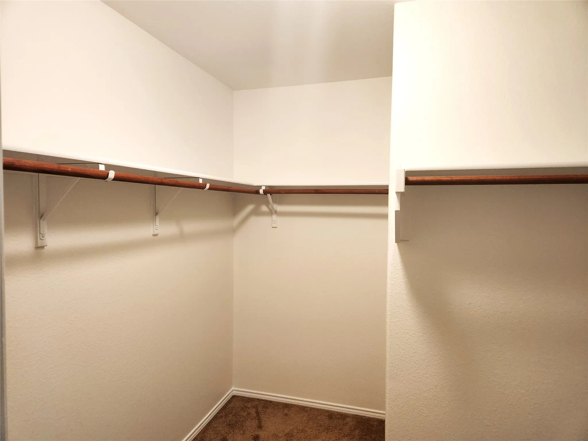Large walk-in closet in primary suite