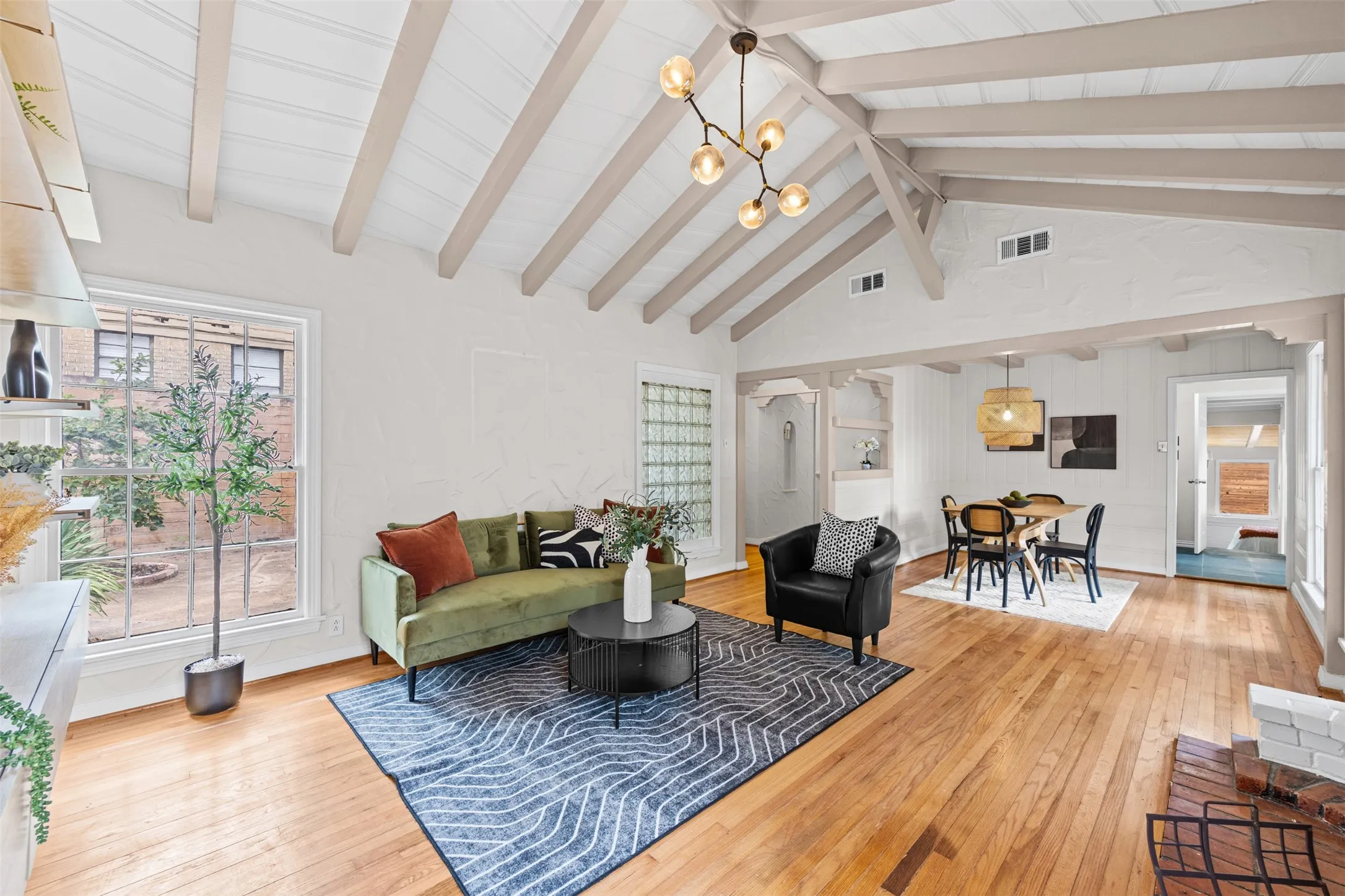 Living room with tons of natural light and hardwoods