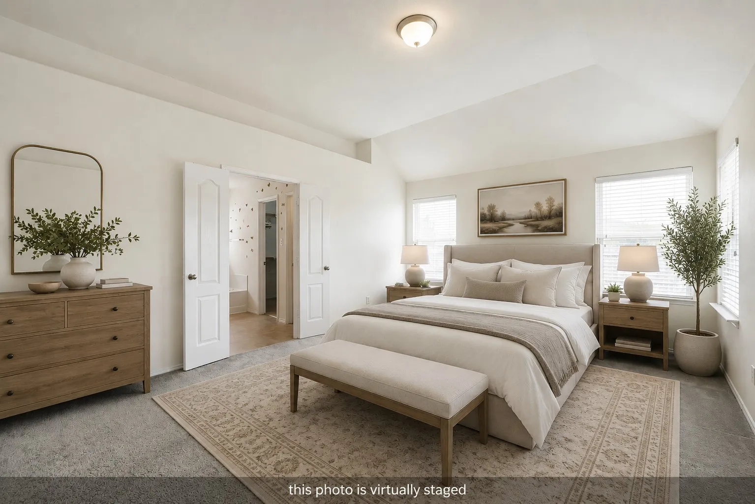 Spacious bedroom featuring vaulted ceilings, a ceiling-mounted light fixture, carpet flooring, and two windows with blinds