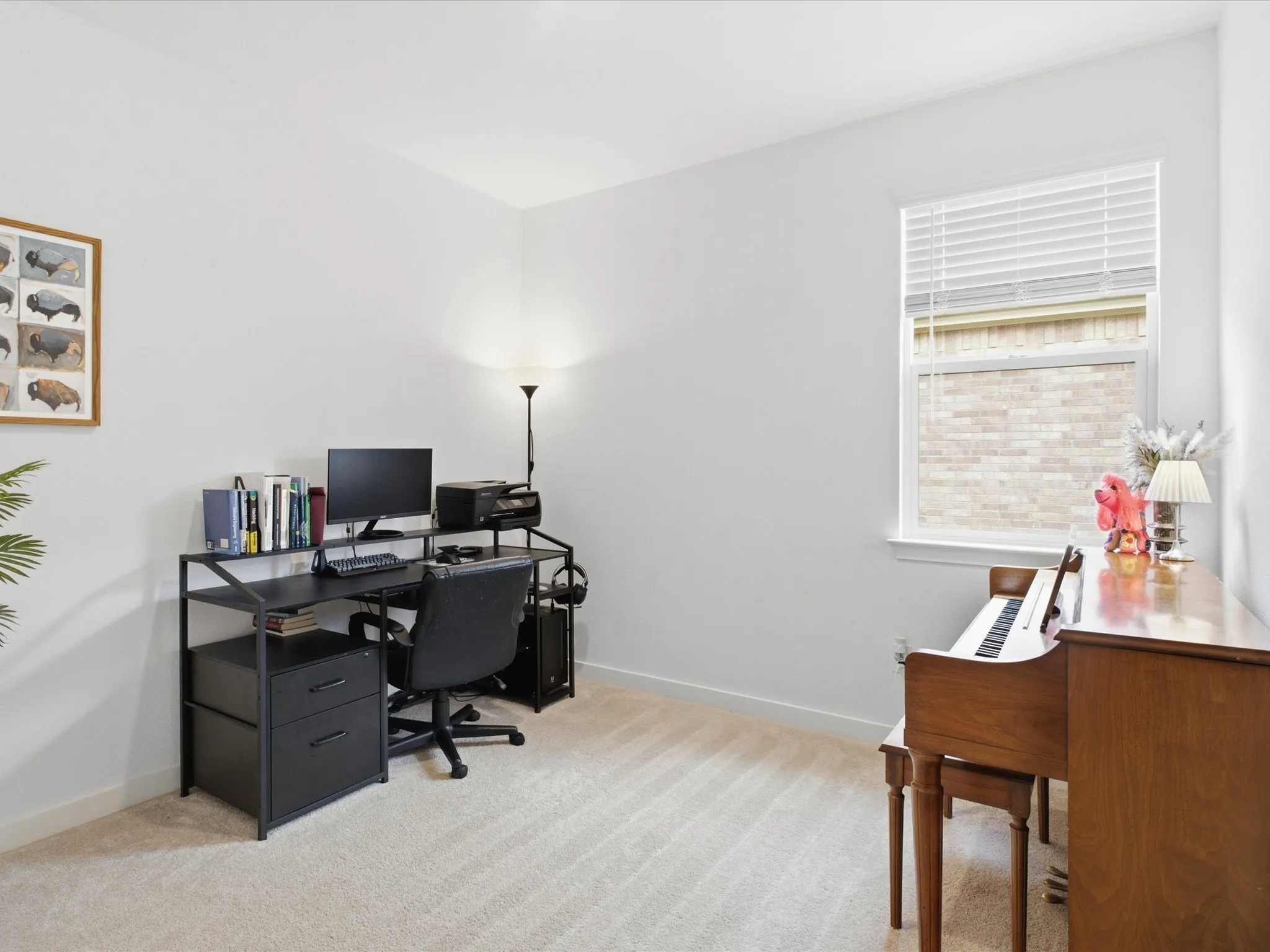 Versatile room featuring light neutral wall paint and plush carpet flooring