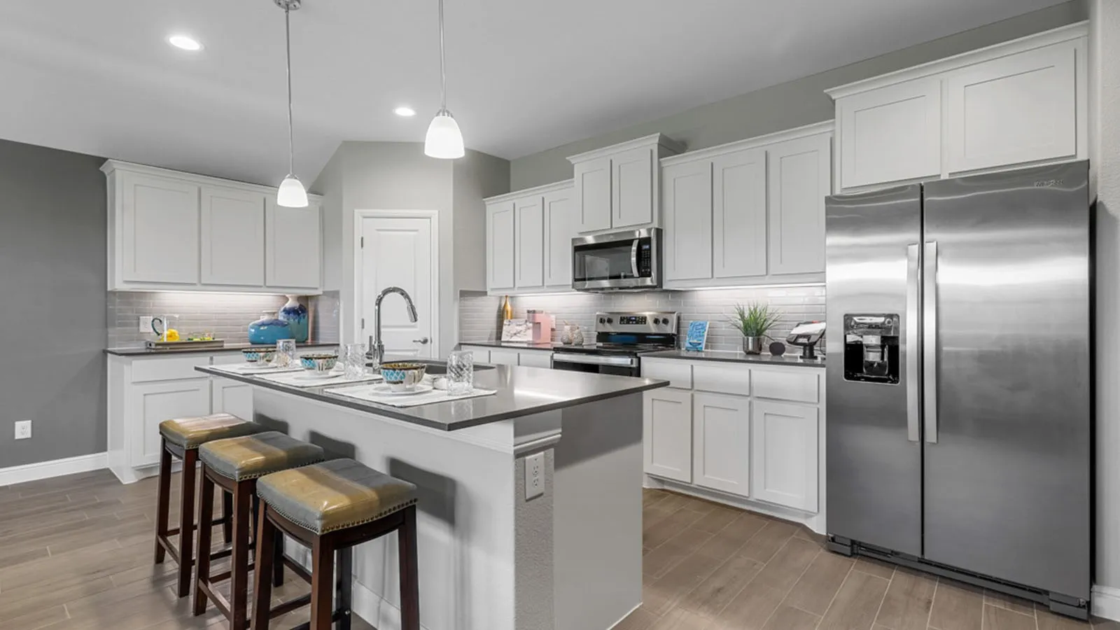 Kitchen - All Home and community information, including pricing, included features, terms, availability and amenities, are subject to change at any time without notice or obligation. All Drawings, pictures, photographs, video, square footages, floor plans, elevations, features, colors and sizes are approximate for illustration purposes only and will vary from the homes as built.
