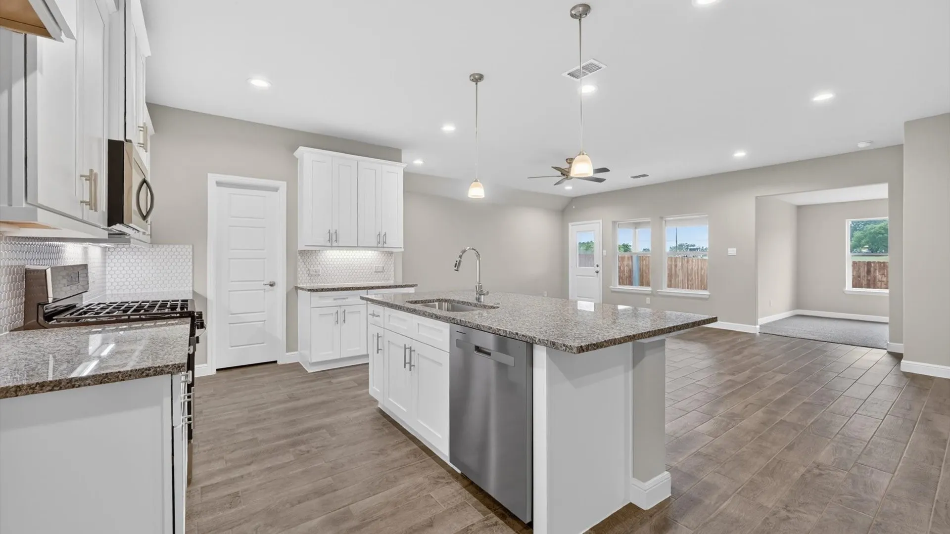 Kitchen - All Home and community information, including pricing, included features, terms, availability and amenities, are subject to change at any time without notice or obligation. All Drawings, pictures, photographs, video, square footages, floor plans, elevations, features, colors and sizes are approximate for illustration purposes only and will vary from the homes as built.

