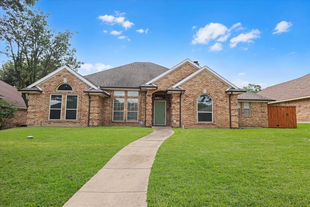 Virtual View of Front of home - virtual green grass