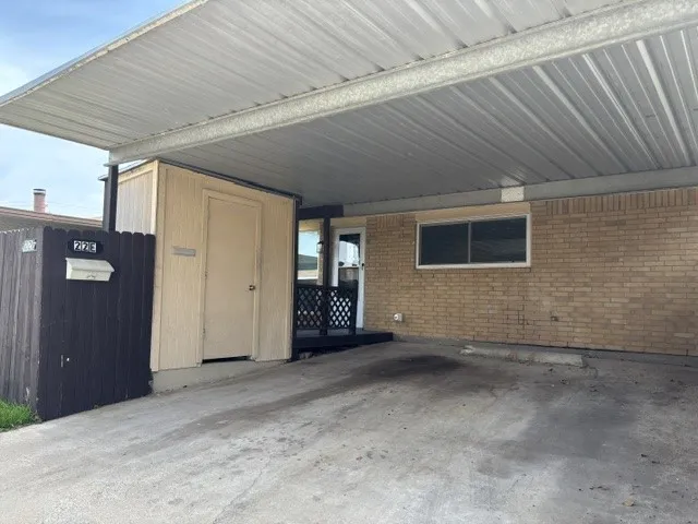 Two car carport for vehicle protection
