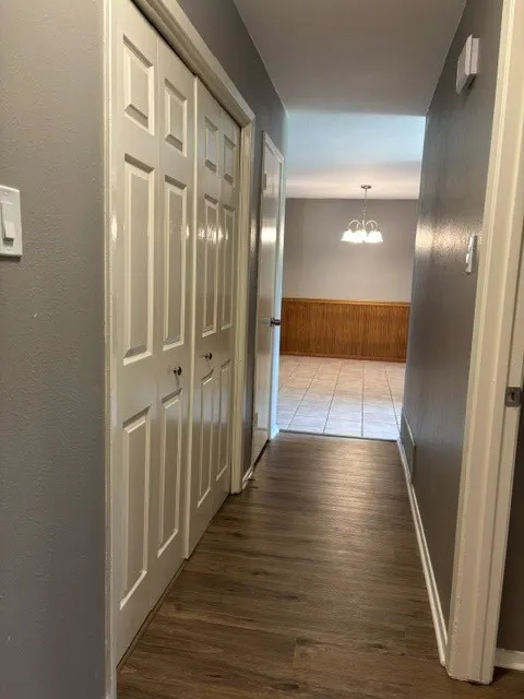 Leading by laundry towards living and kitchen