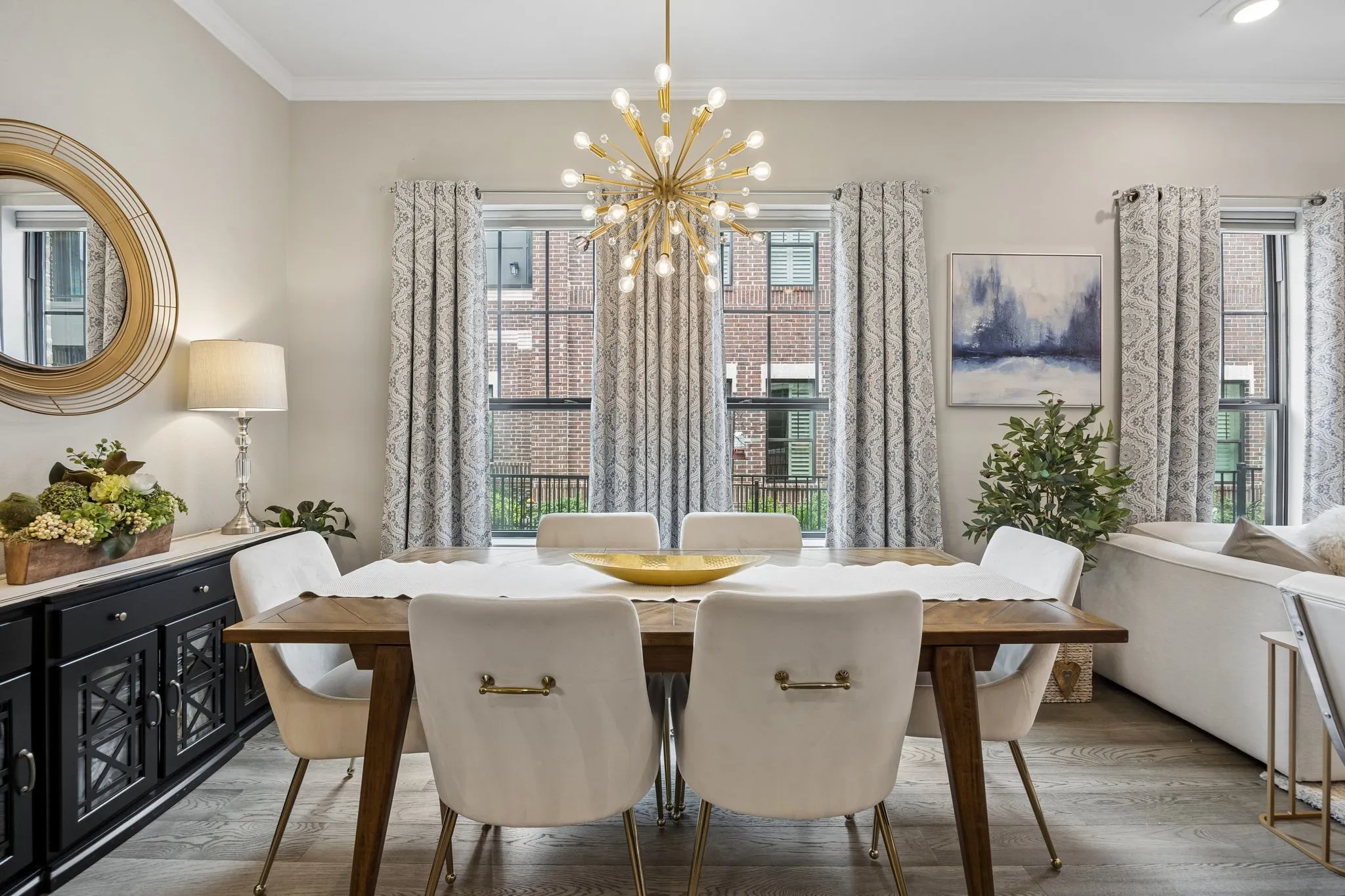 Timless designed dining area with designer lighting