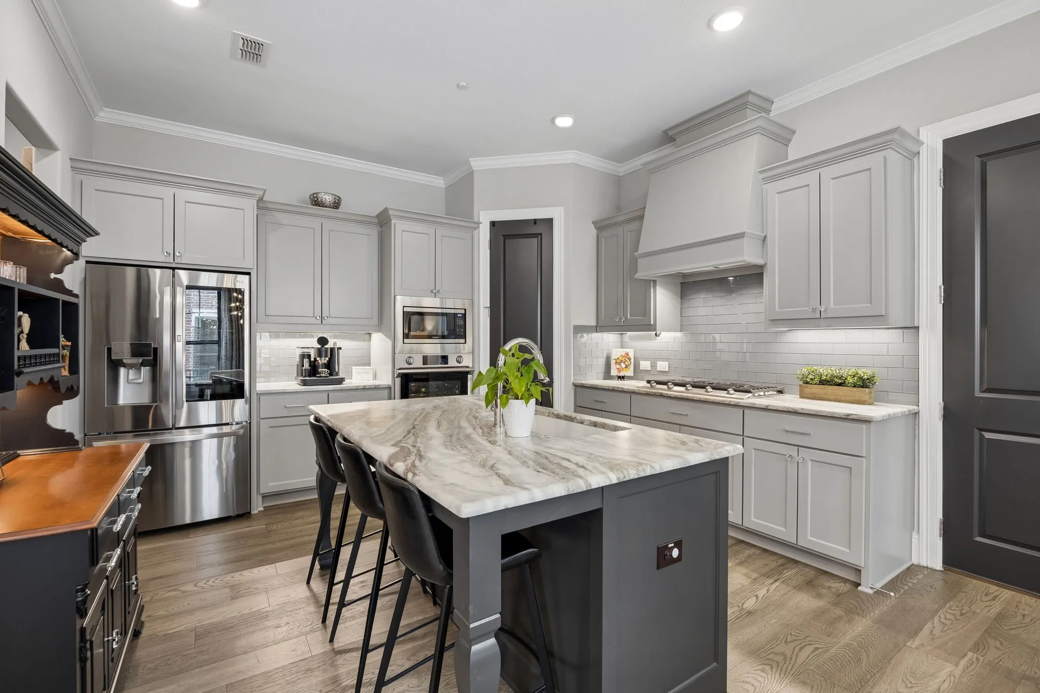 Upgraded kitchen with honed granite counters