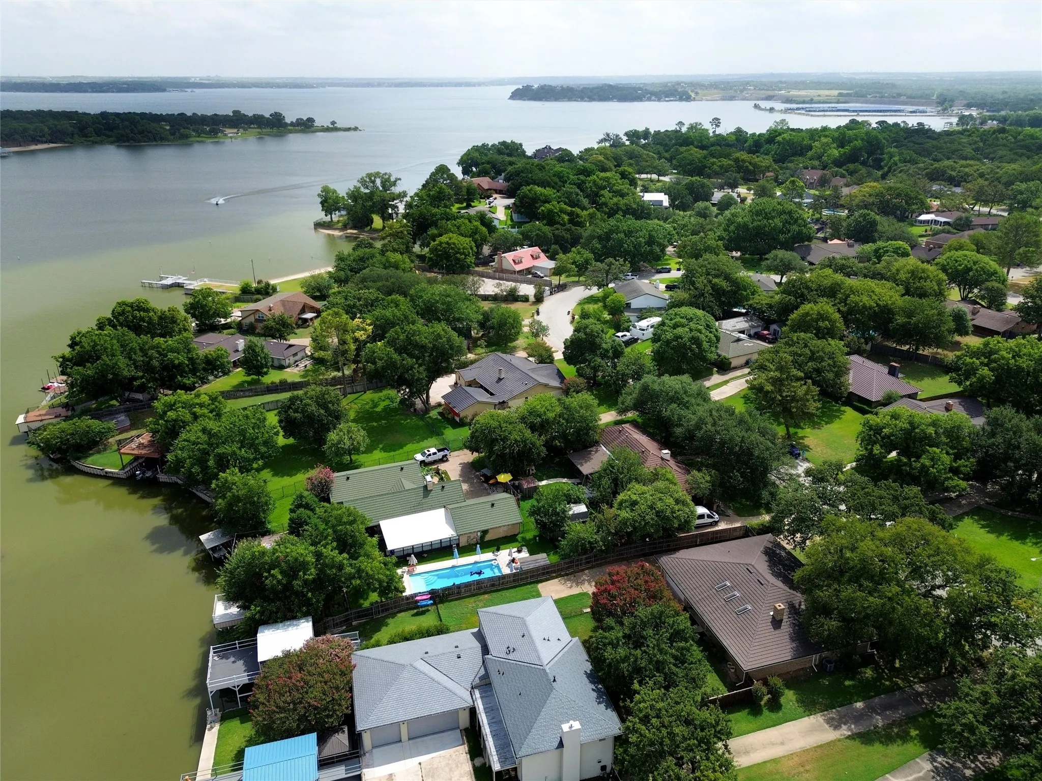 Eagle Mountain Lake! The "U-shaped" pier to the upper left is the neighborhood pier; that is Eagle Mountain Marina at the top right of this photo.