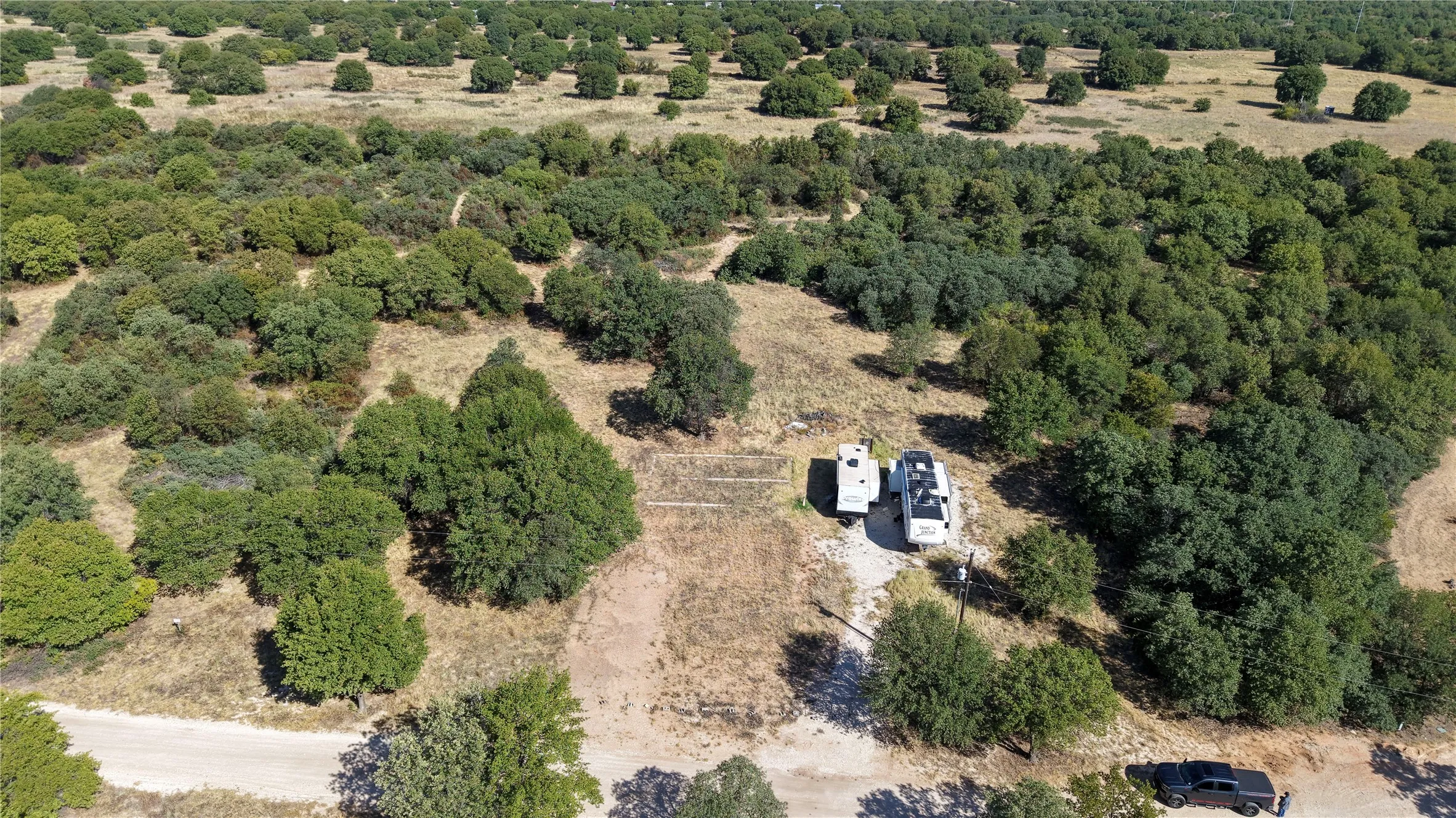 Expansive natural landscape with significant tree coverage