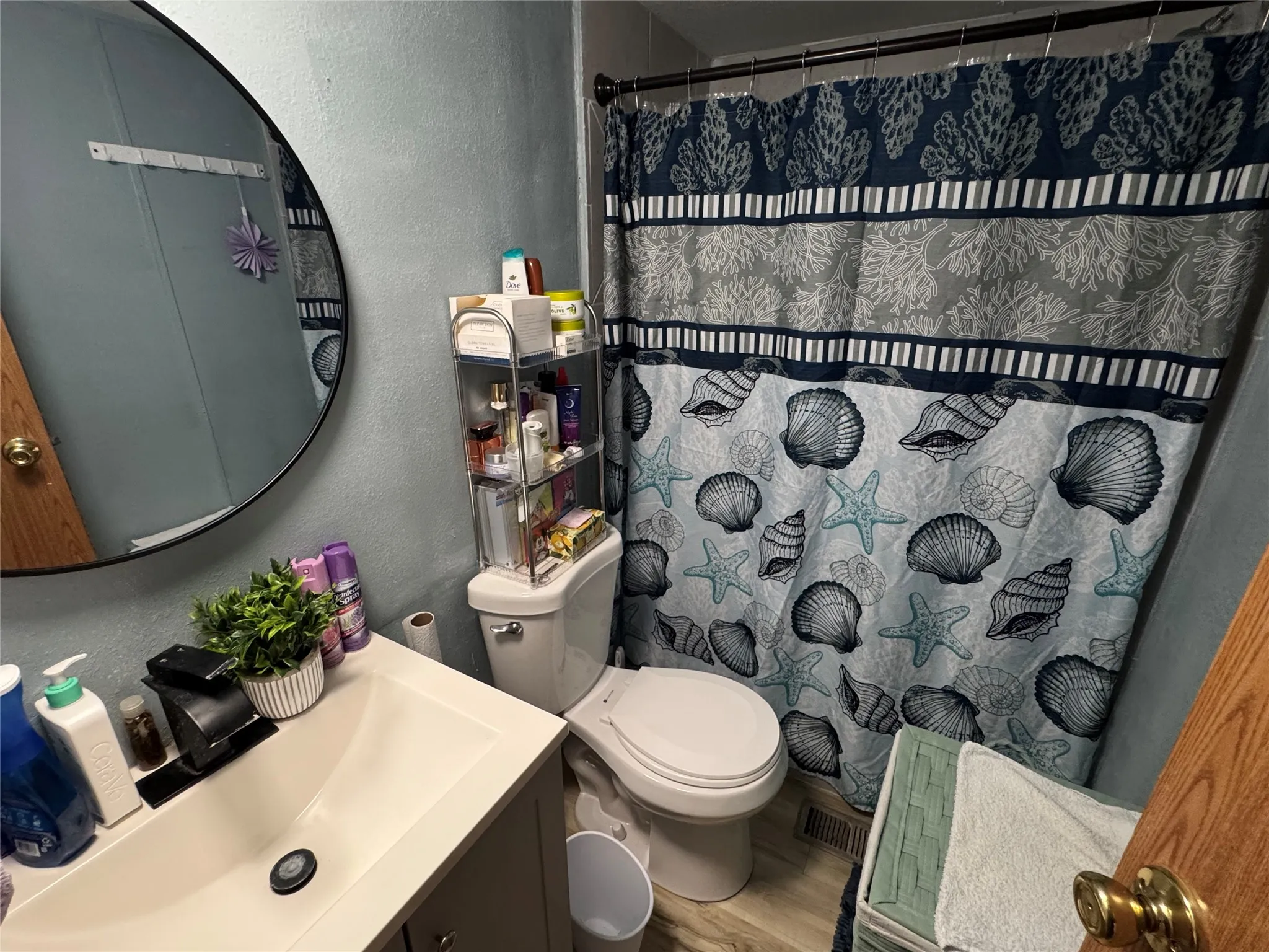 Modern bathroom vanity with integrated sink and black faucet