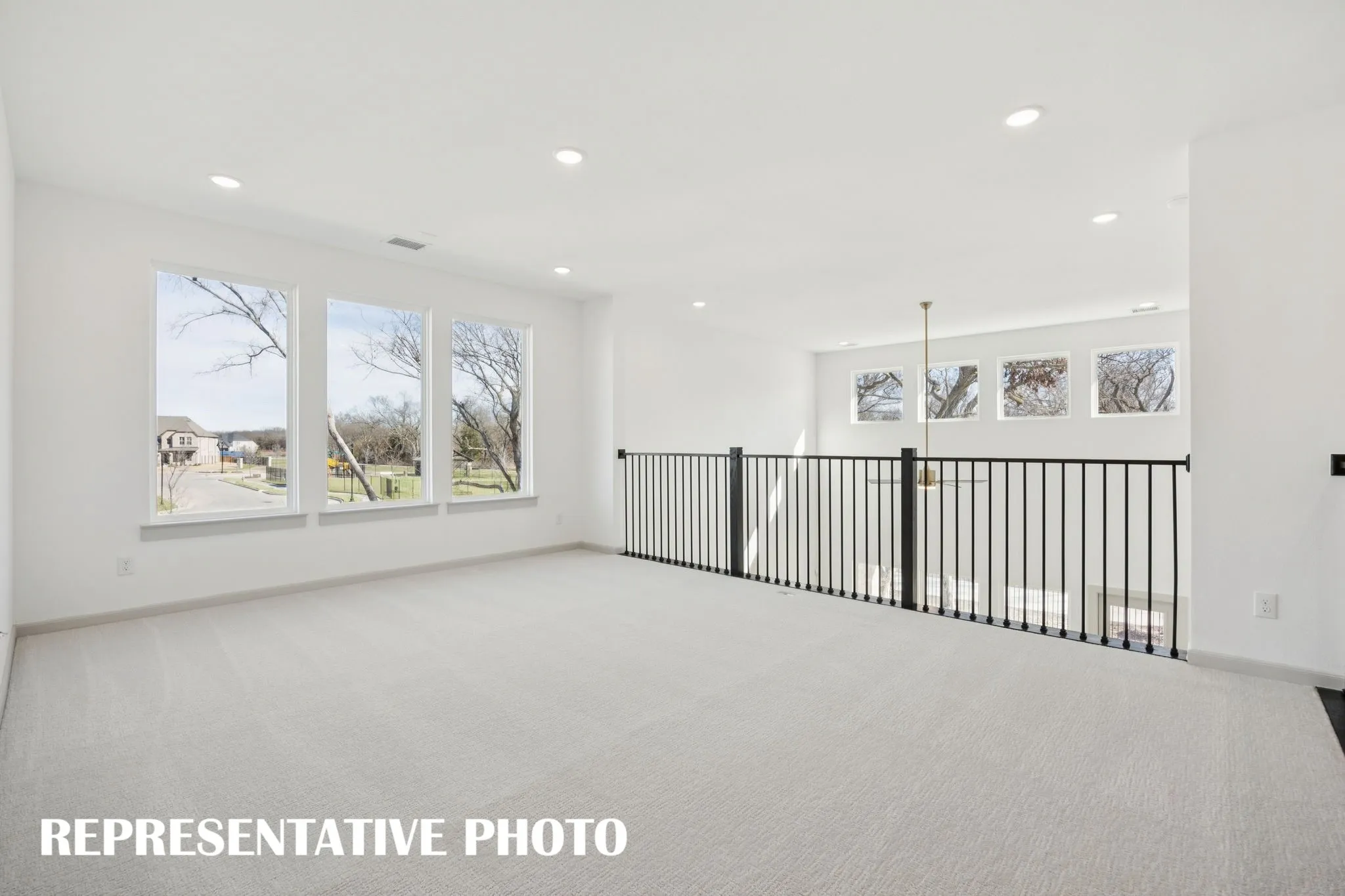 Open and airy, you'll find plenty of space for family fun in this outstanding game room!  REPRESENTATIVE PHOTO