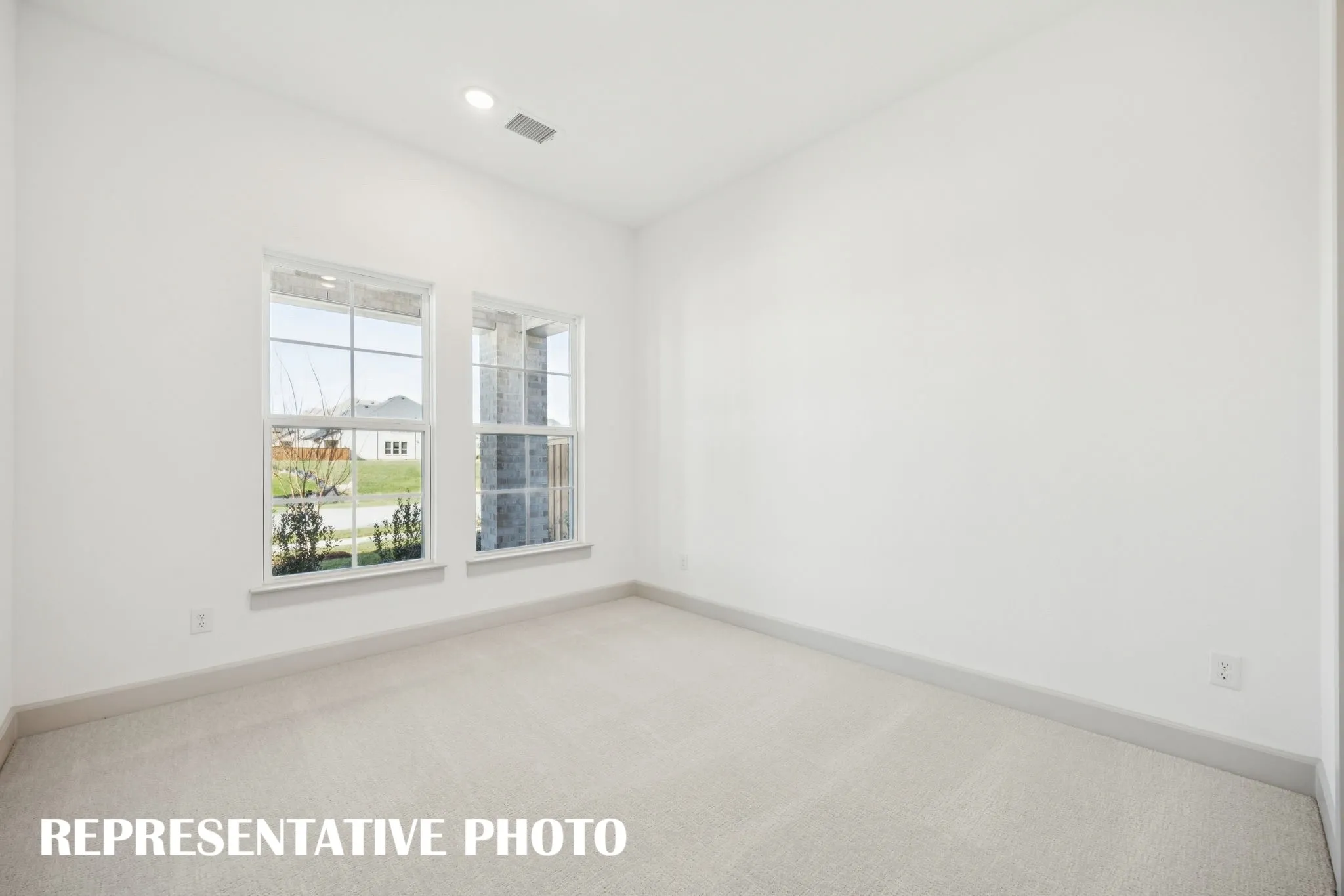 You'll find nicely sized secondary bedrooms in our Versailles plan.  REPRESENTATIVE PHOTO