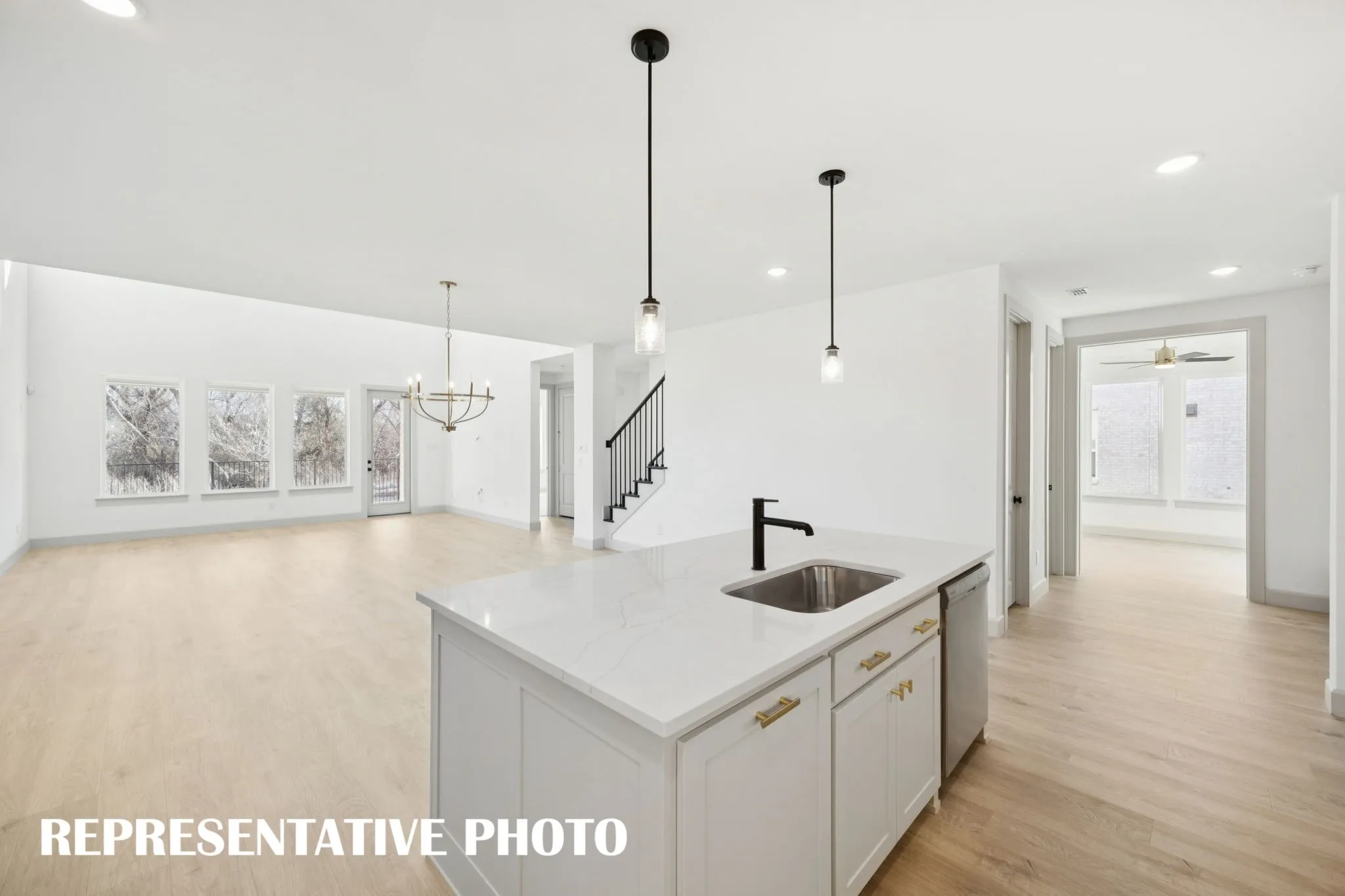 The chef will never be left out of the party in this wonderful open concept dream home!  REPRESENTATIVE PHOTO
