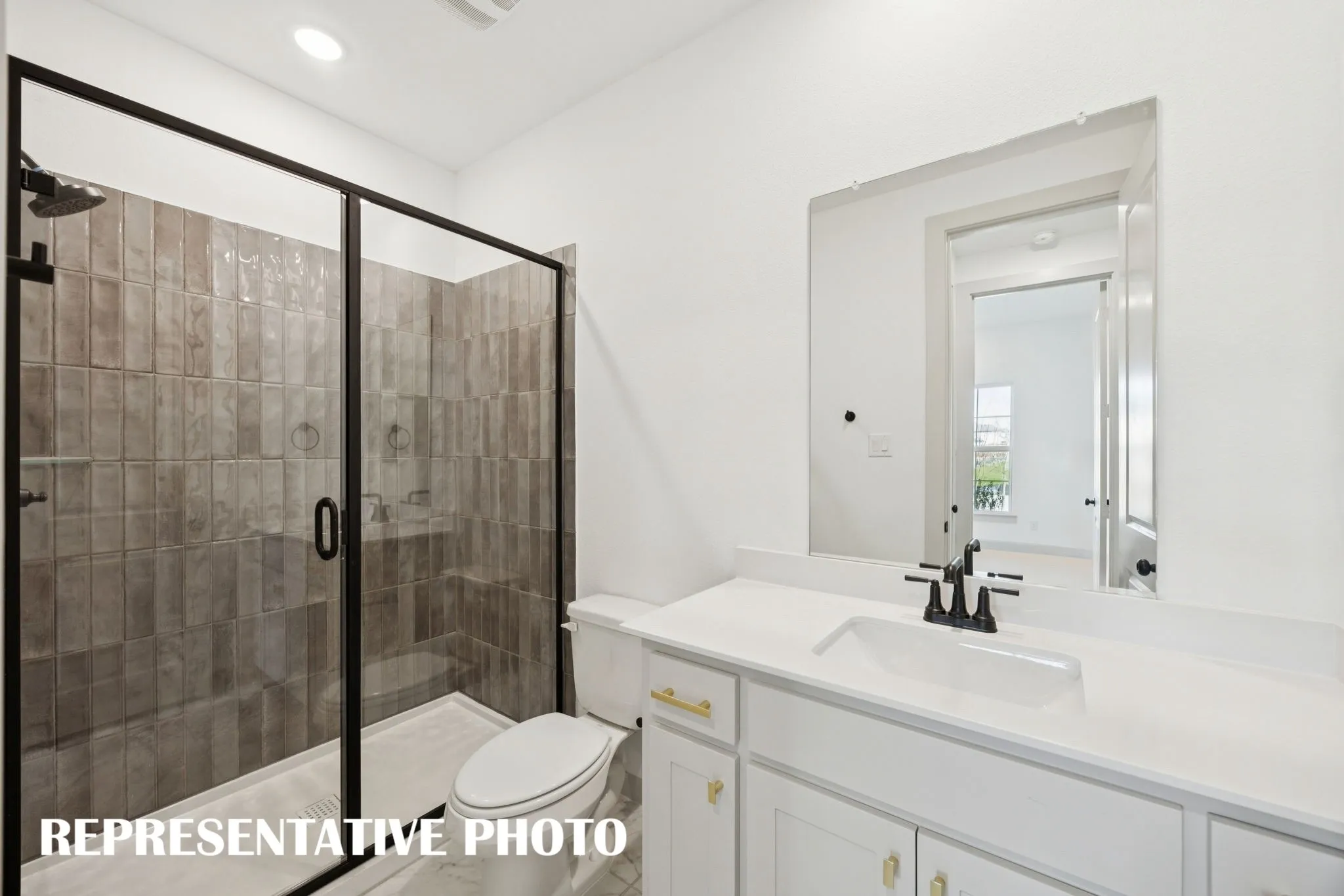 Friends and family will feel right at home in any of the beautfiully finished guest baths offered in our Versailles plan.  REPRESENTATIVE PHOTO