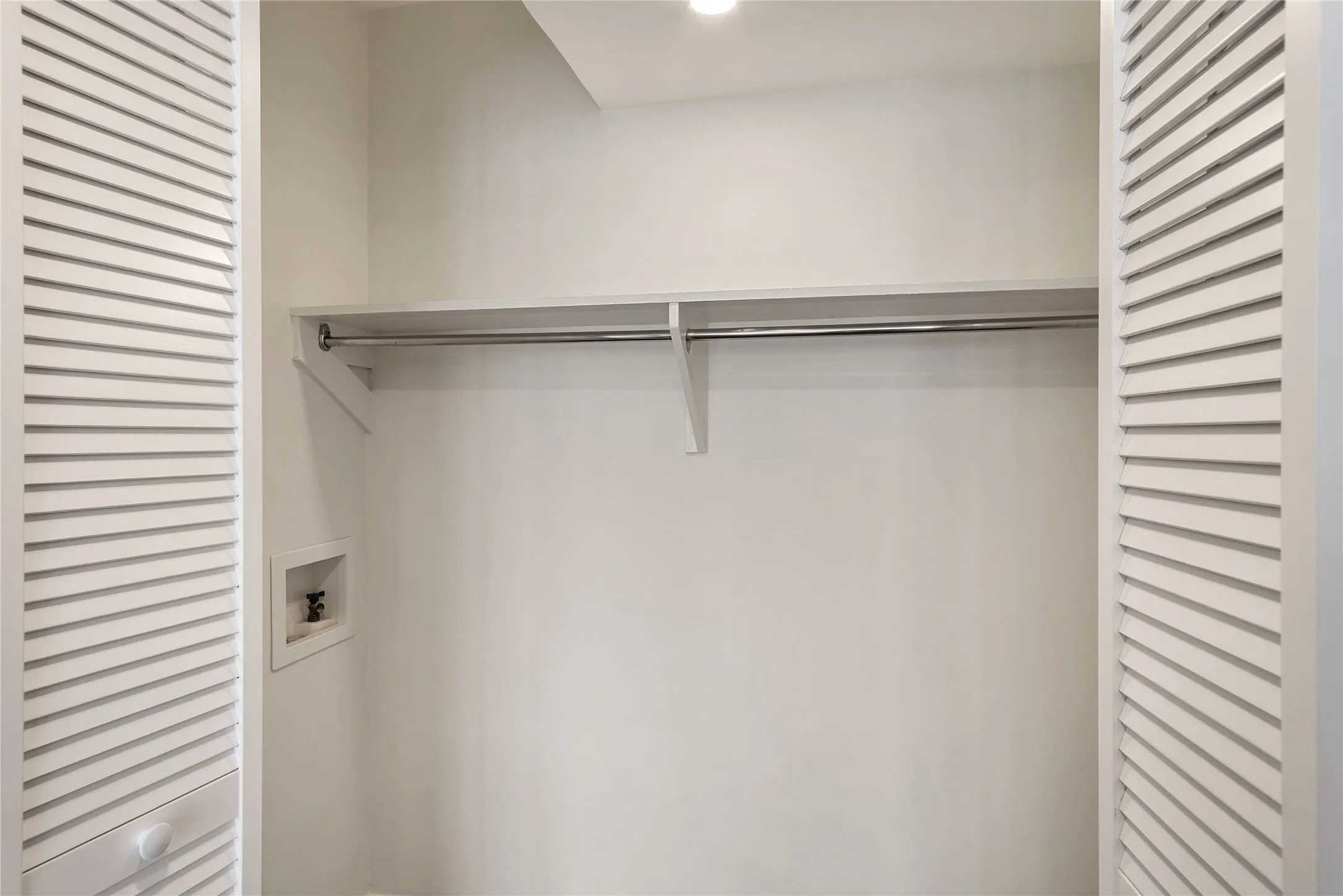 Large laundry closet fits full size washer and dryer
