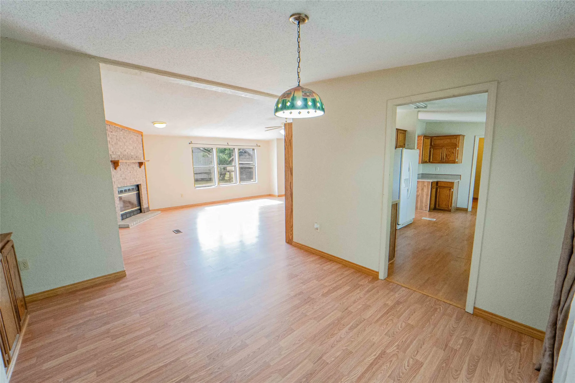 Dining room open to living area and adjacent to kitchen-