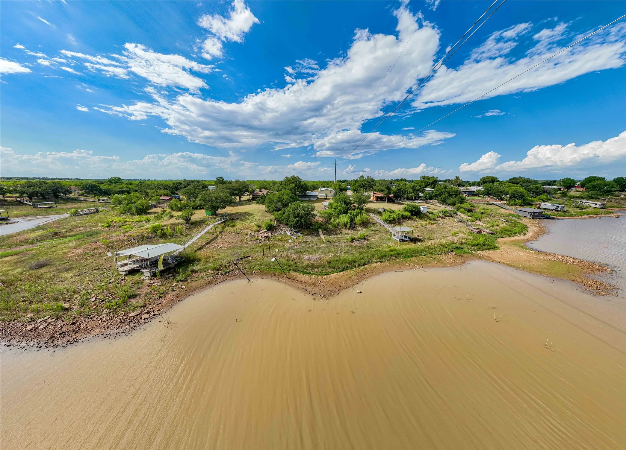Expansive waterfront property featuring direct water access, and a path leading to the water's edge