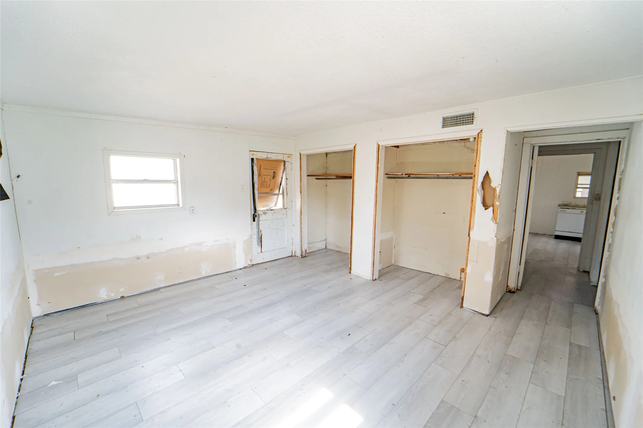 Guest Quarters/ Large Bedroom-Light wood-finish flooring throughout