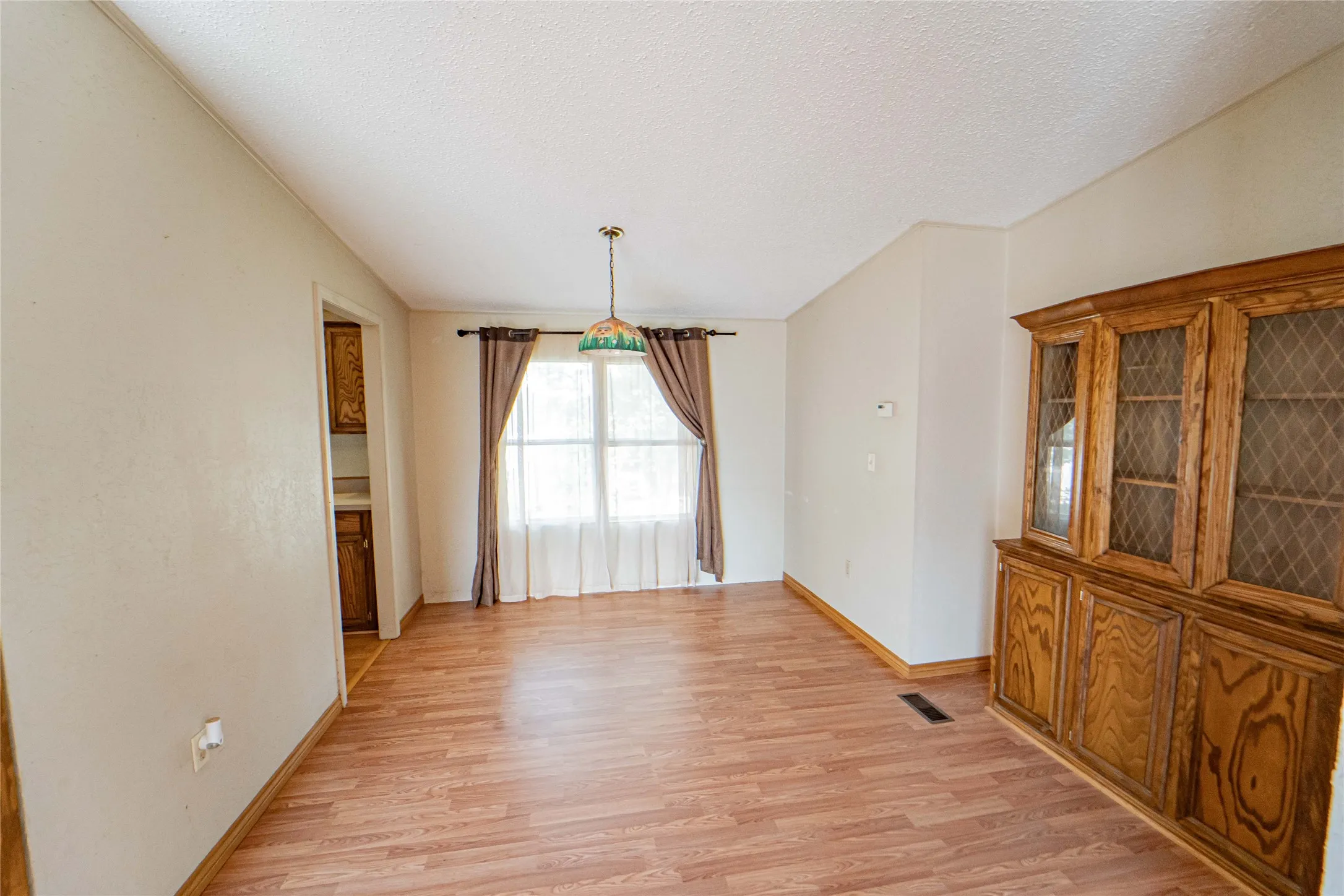 Full Dining room open to kitchen and living area-