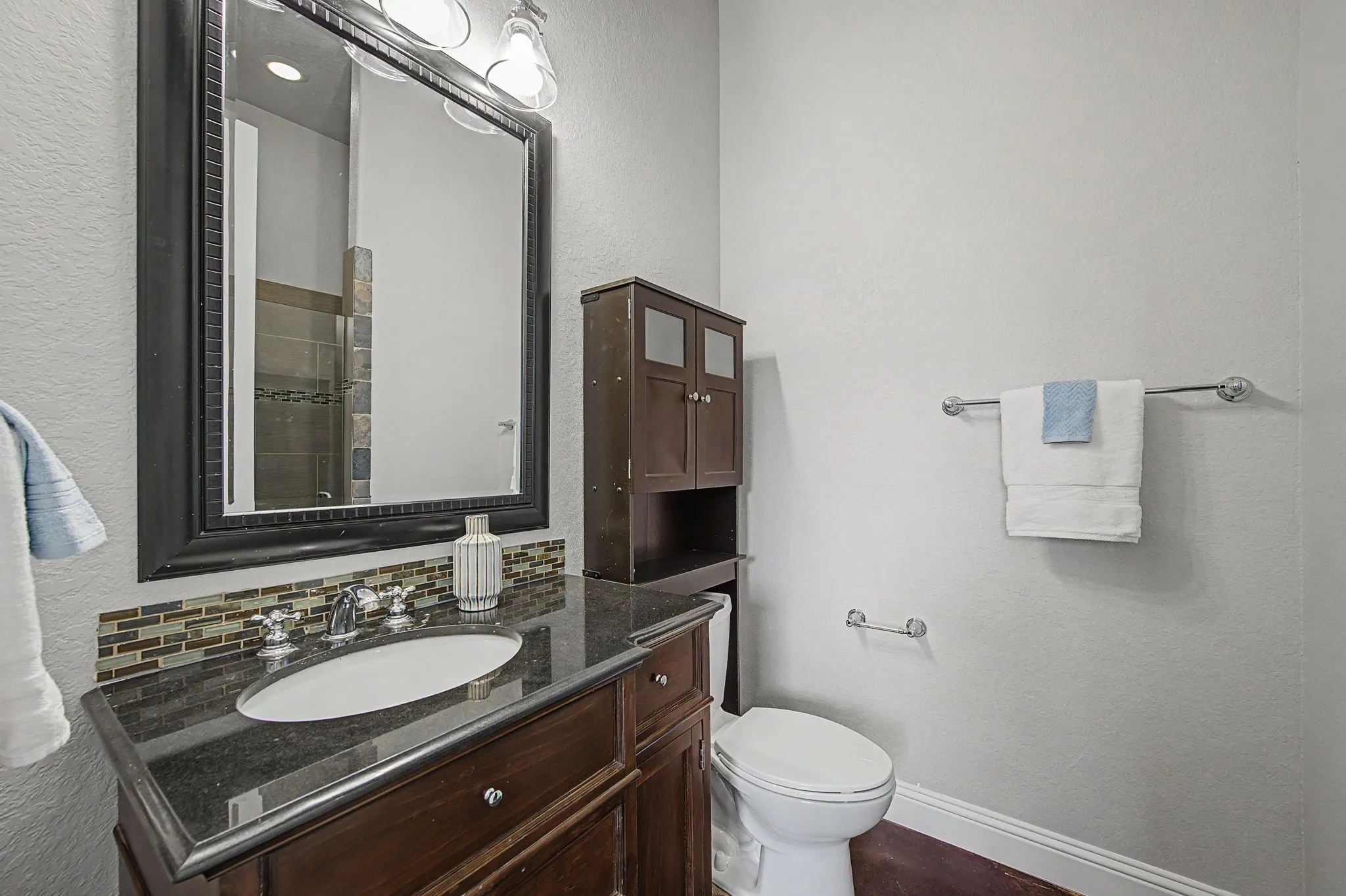 Ensuite bath conveniently connected to a secondary bedroom.