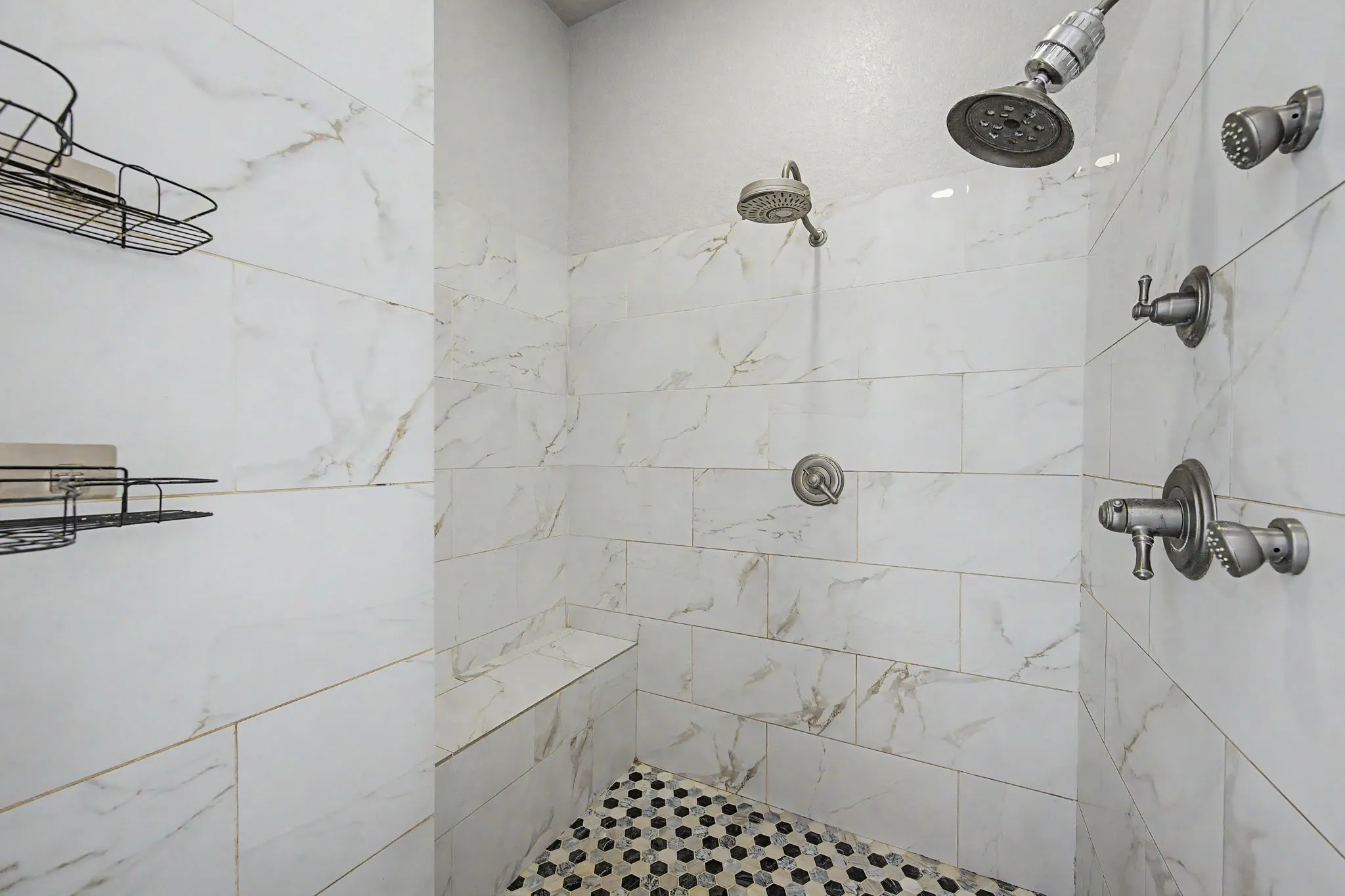 Huge primary shower, pristine with updated black and white finishes