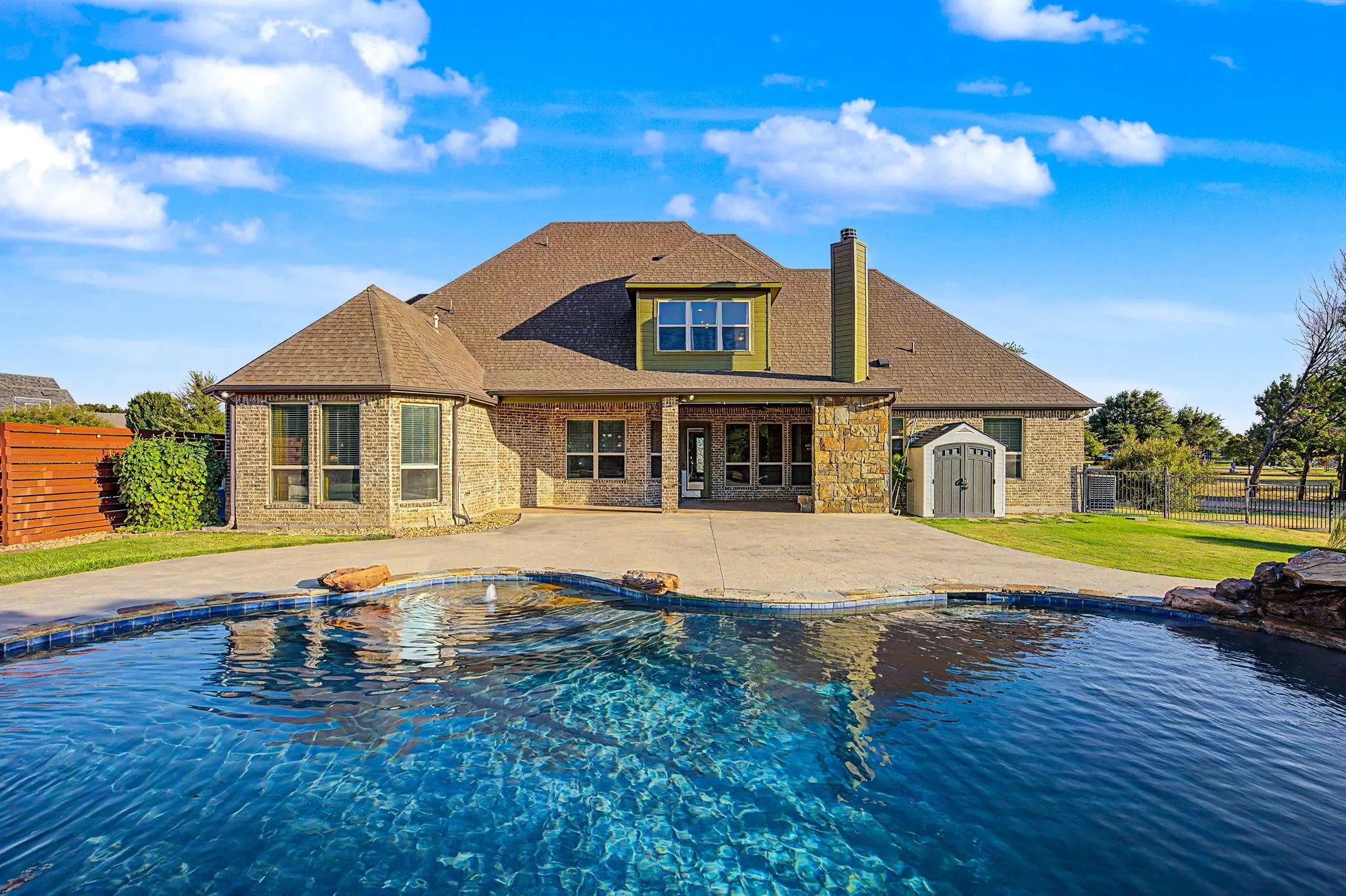Sparkling pool with newer spa and water features are and new screened pool equipment
