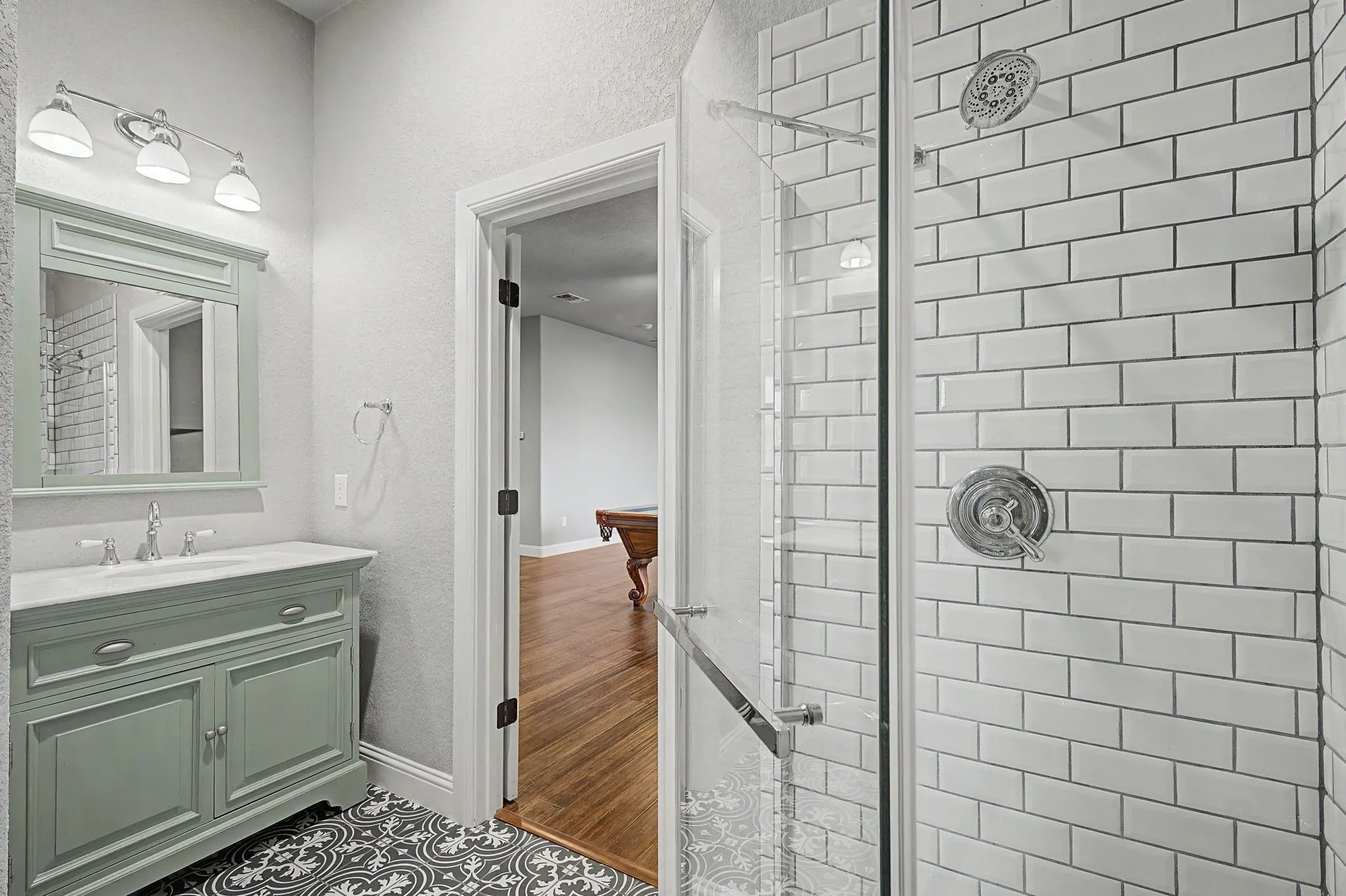 Private ensuite bath serving the upstairs bedroom.