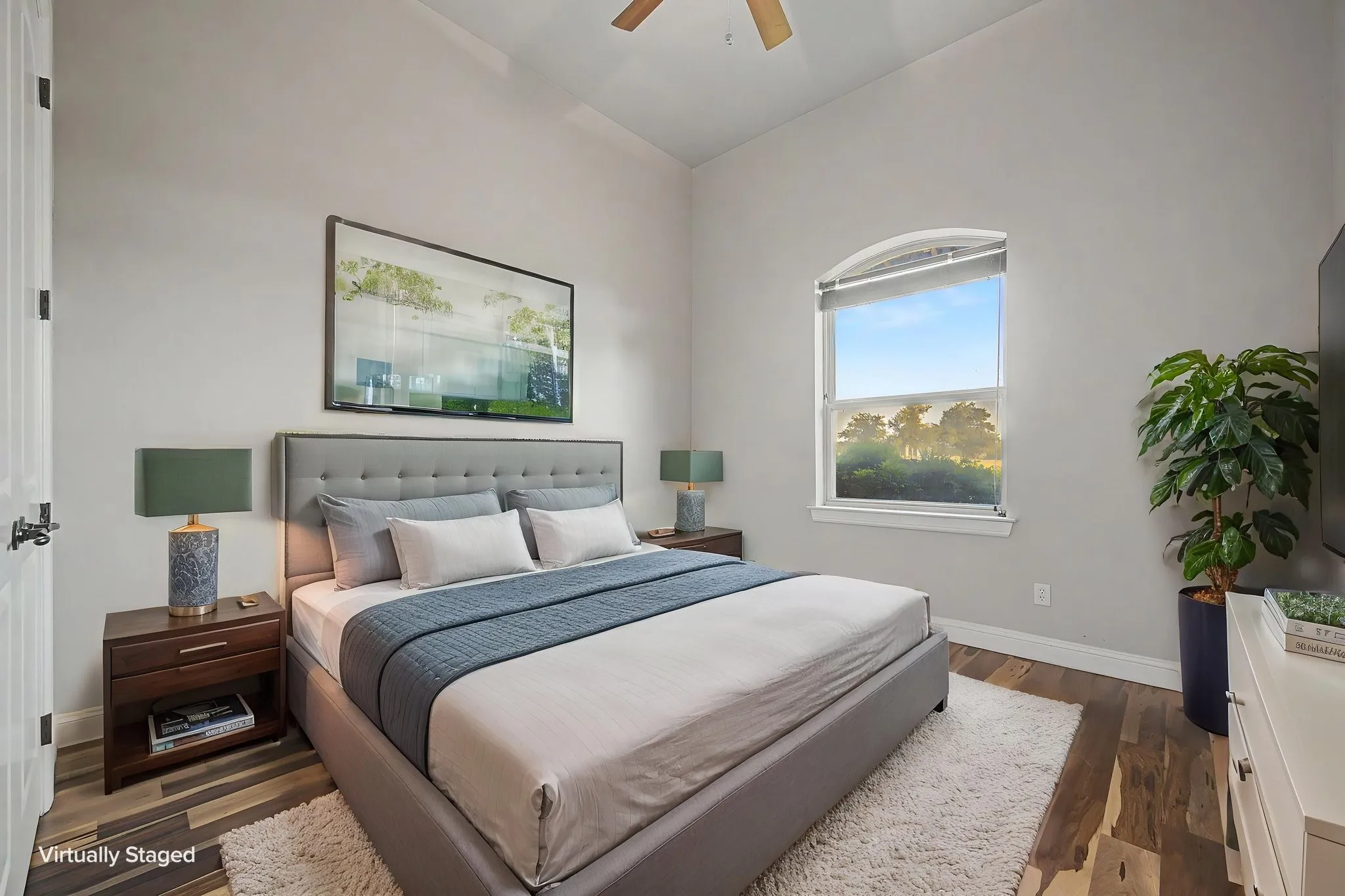 Main-level bedroom offering flexible space for a bedroom, guest room, or home office.
