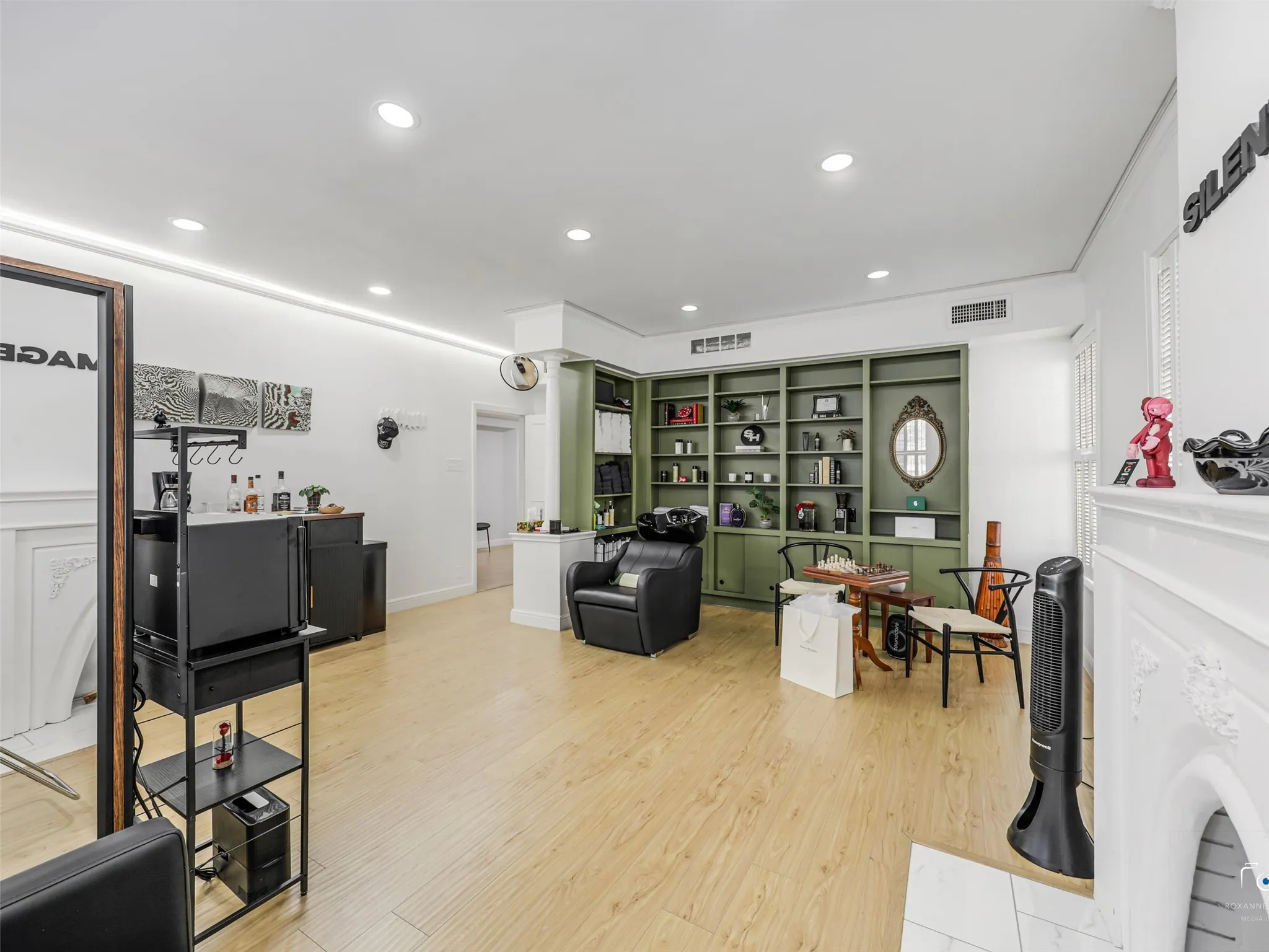 This is suite 102 and is currently occupied by a barber.