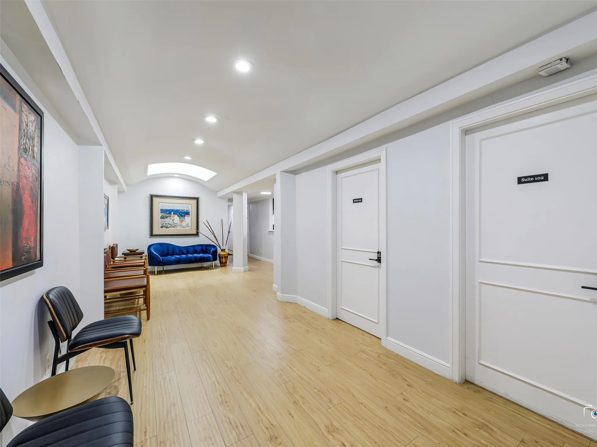 Shared reception/lobby for suites 102, 103, 104 and 105.