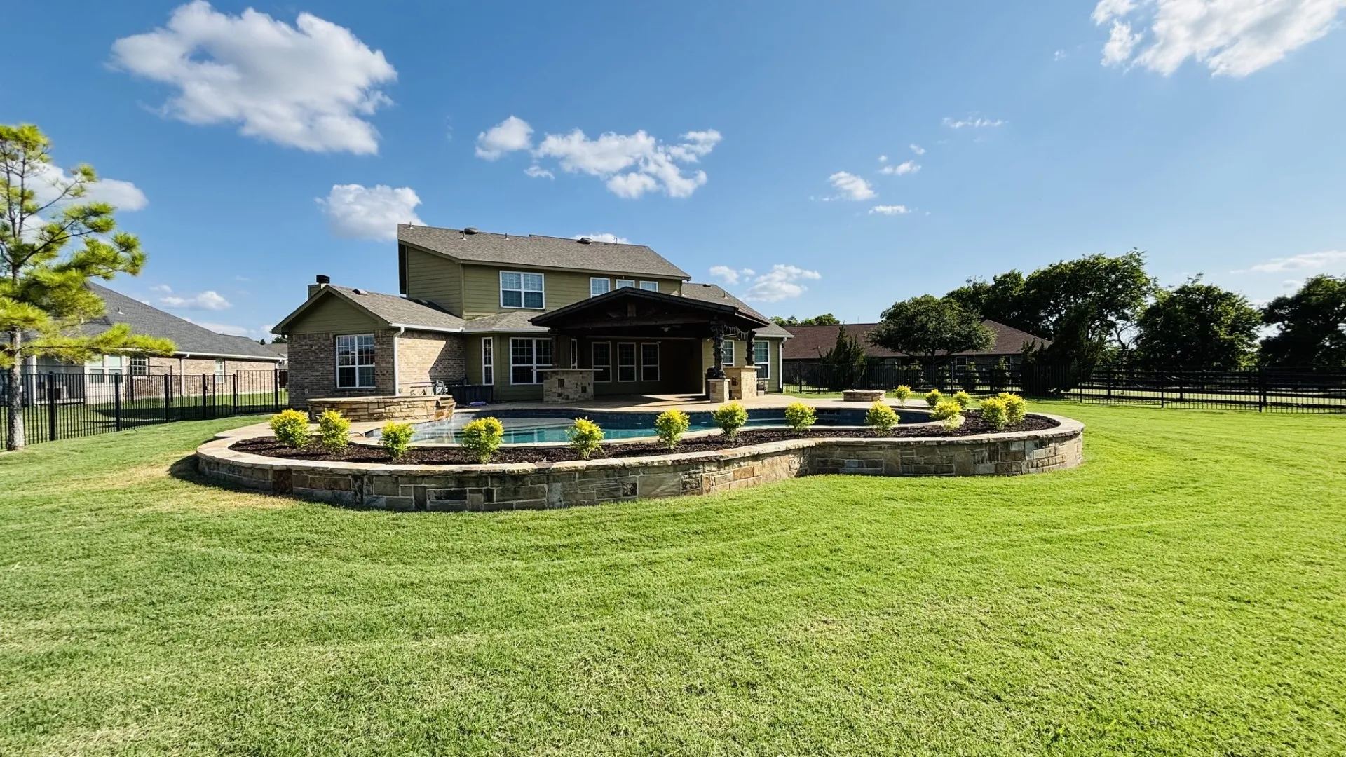 View of the pool area and the inviting outdoor living space.