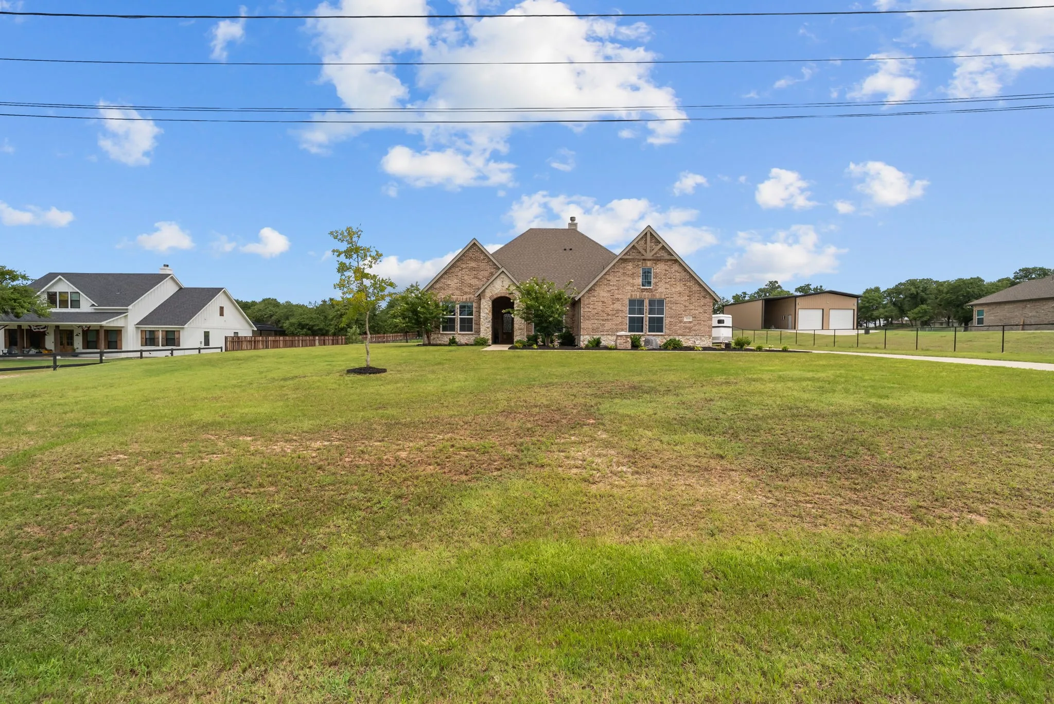 Front of home with good distance from neighbors