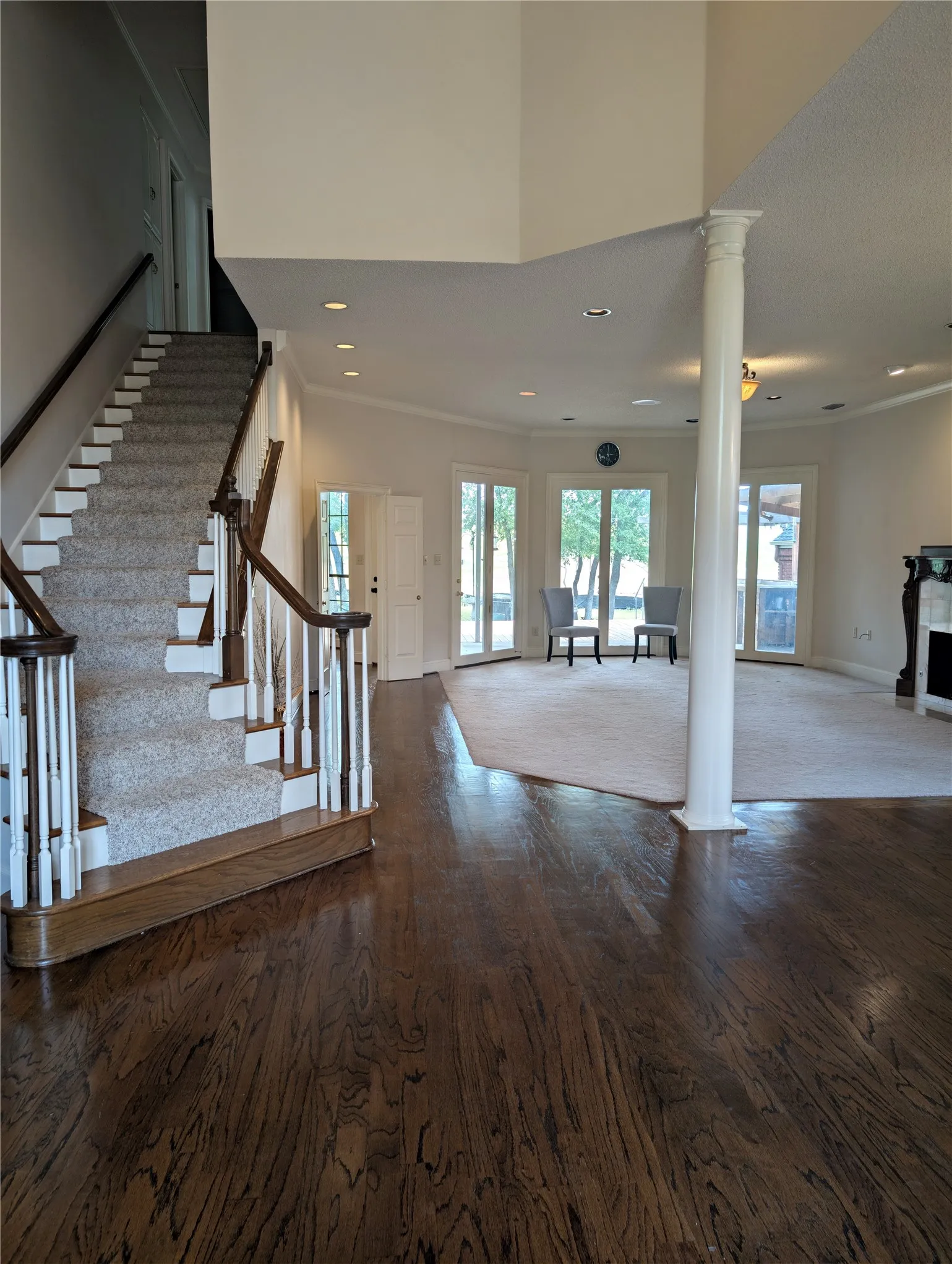 2 story foyer opens up to formal dining room and formal living room