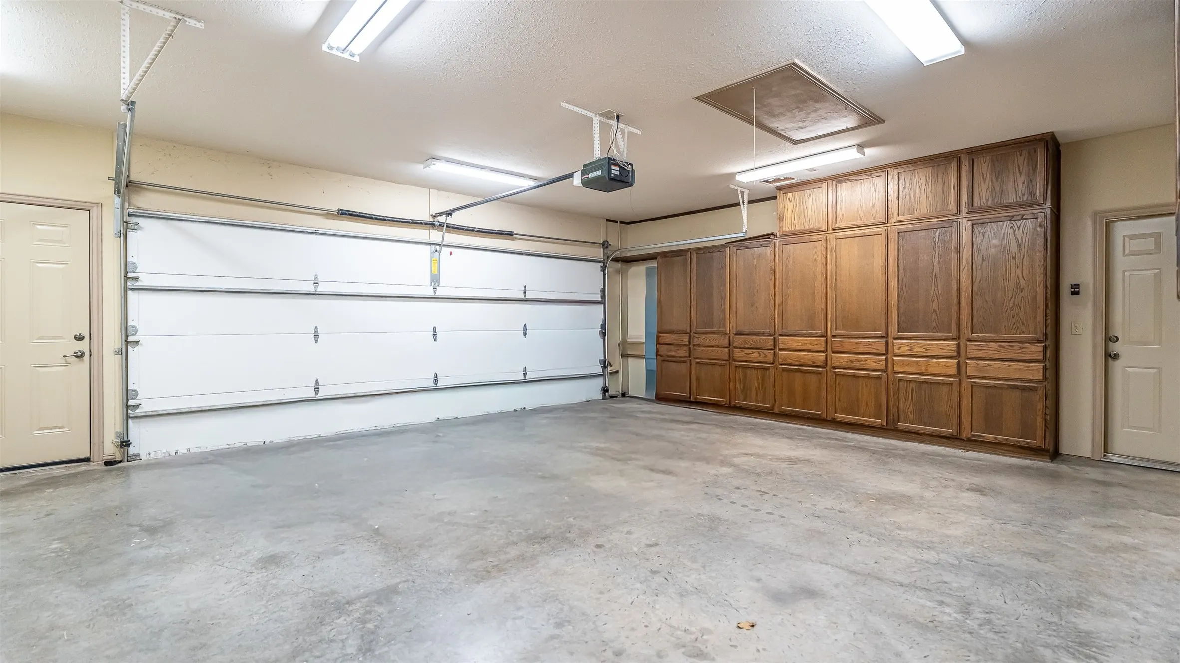 Large Garage with Storage Cabinets