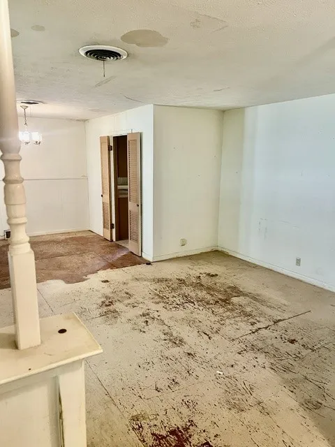 from front door looking into living and dining that passes through to kitchen