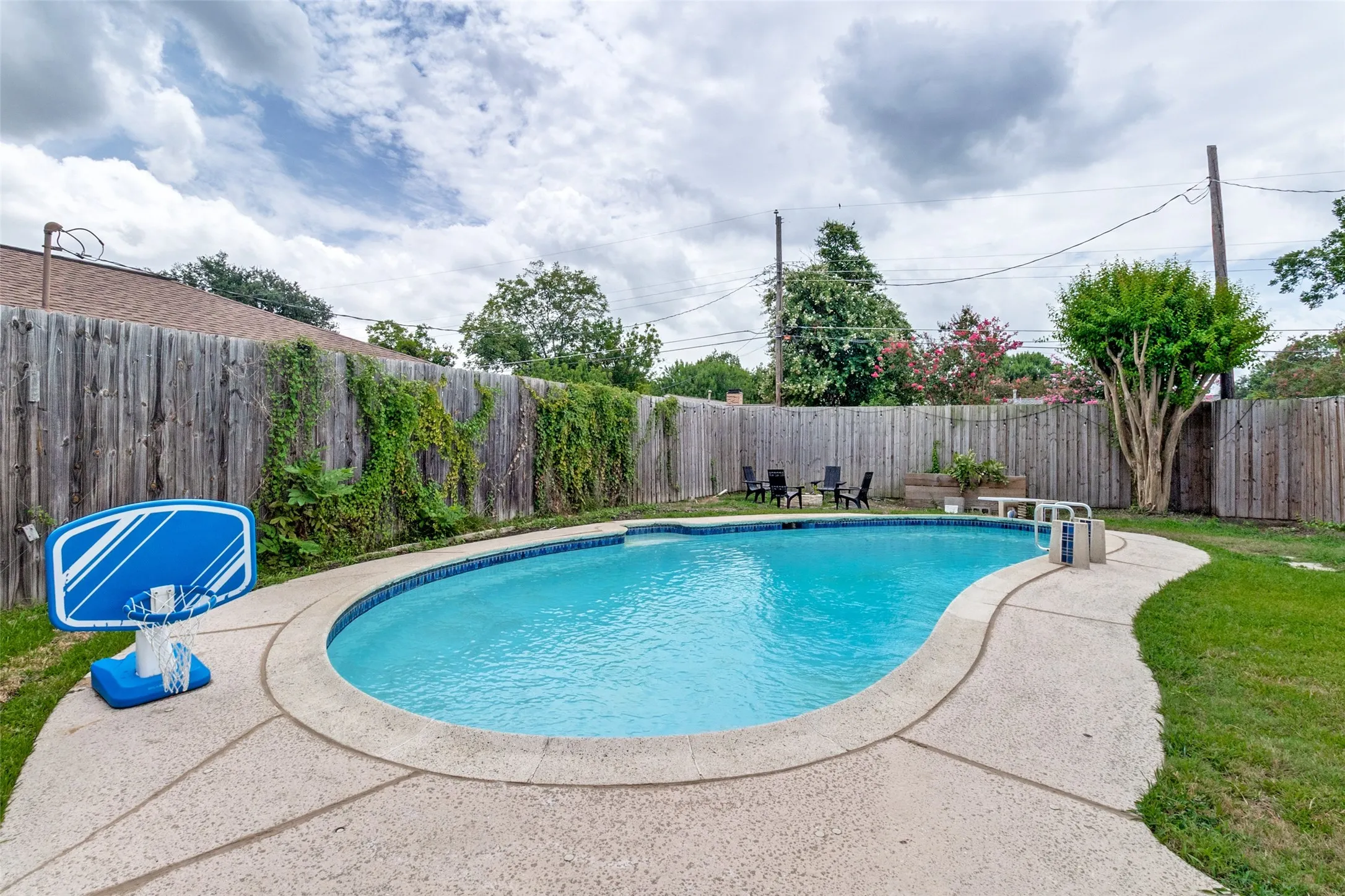 Firepit and grass areas around the pool perfect for entertaining.