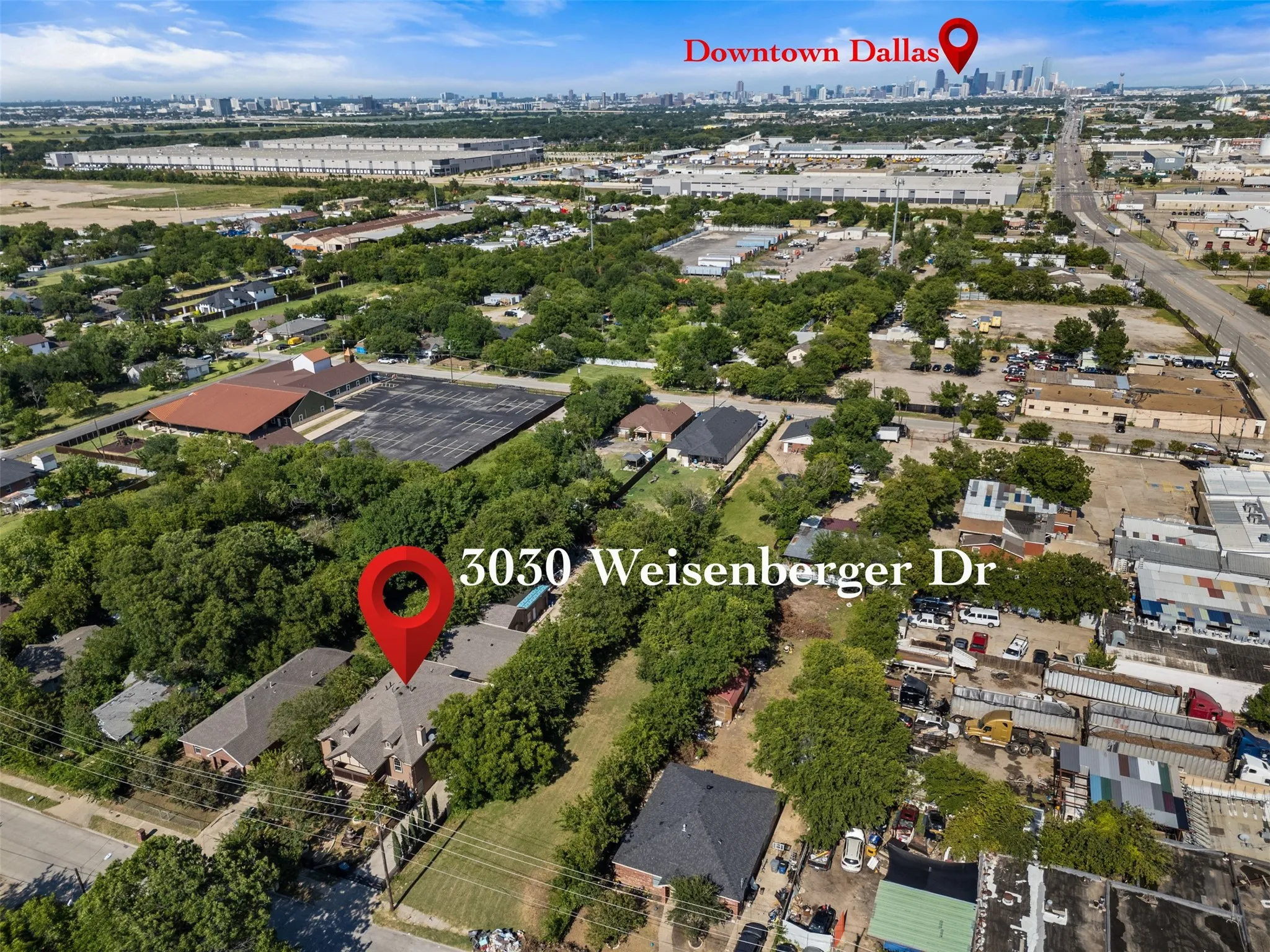 Aerial perspective of a property amidst a mixed-use district