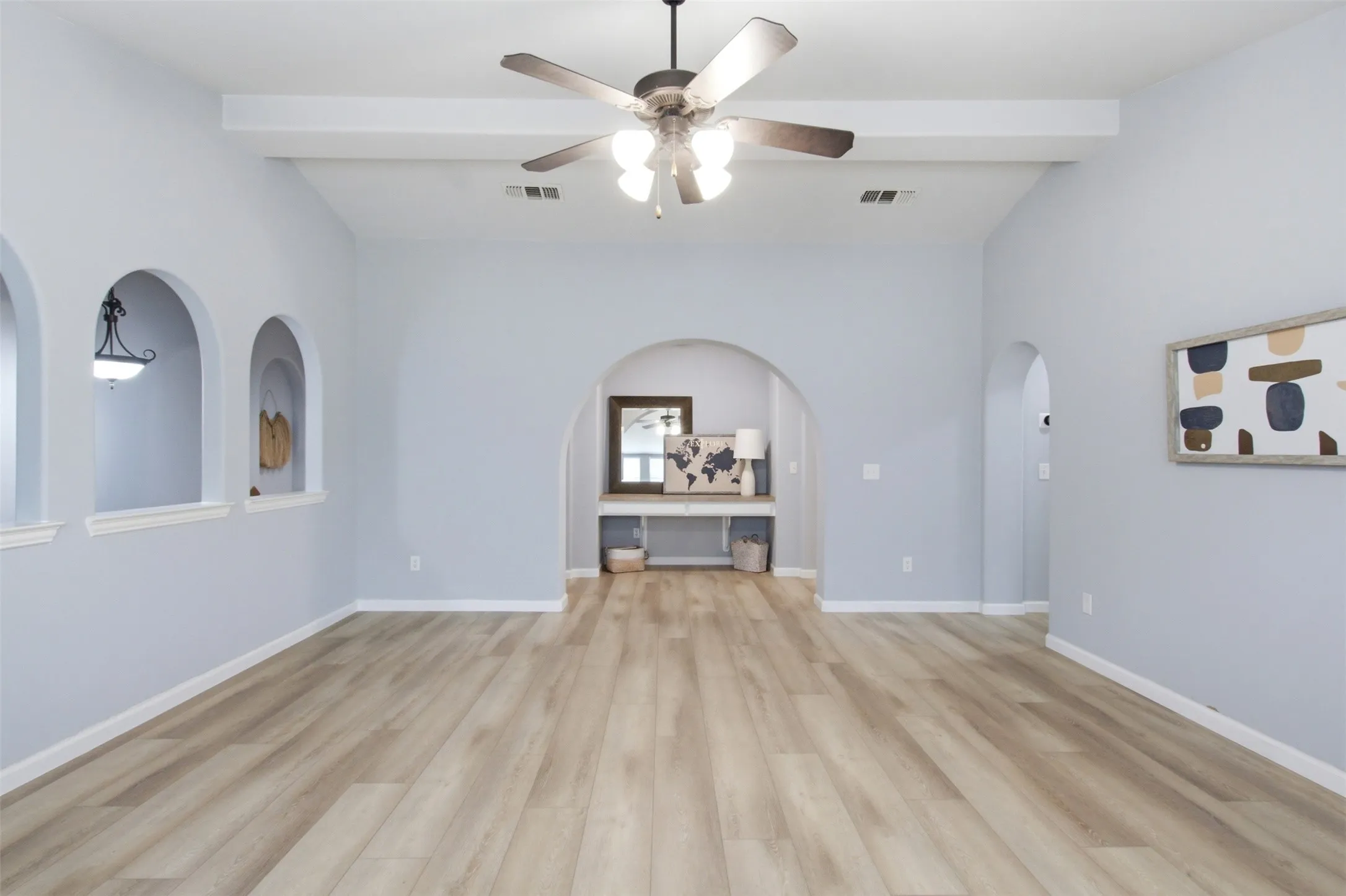 Game Room with view of built-in desk in hall