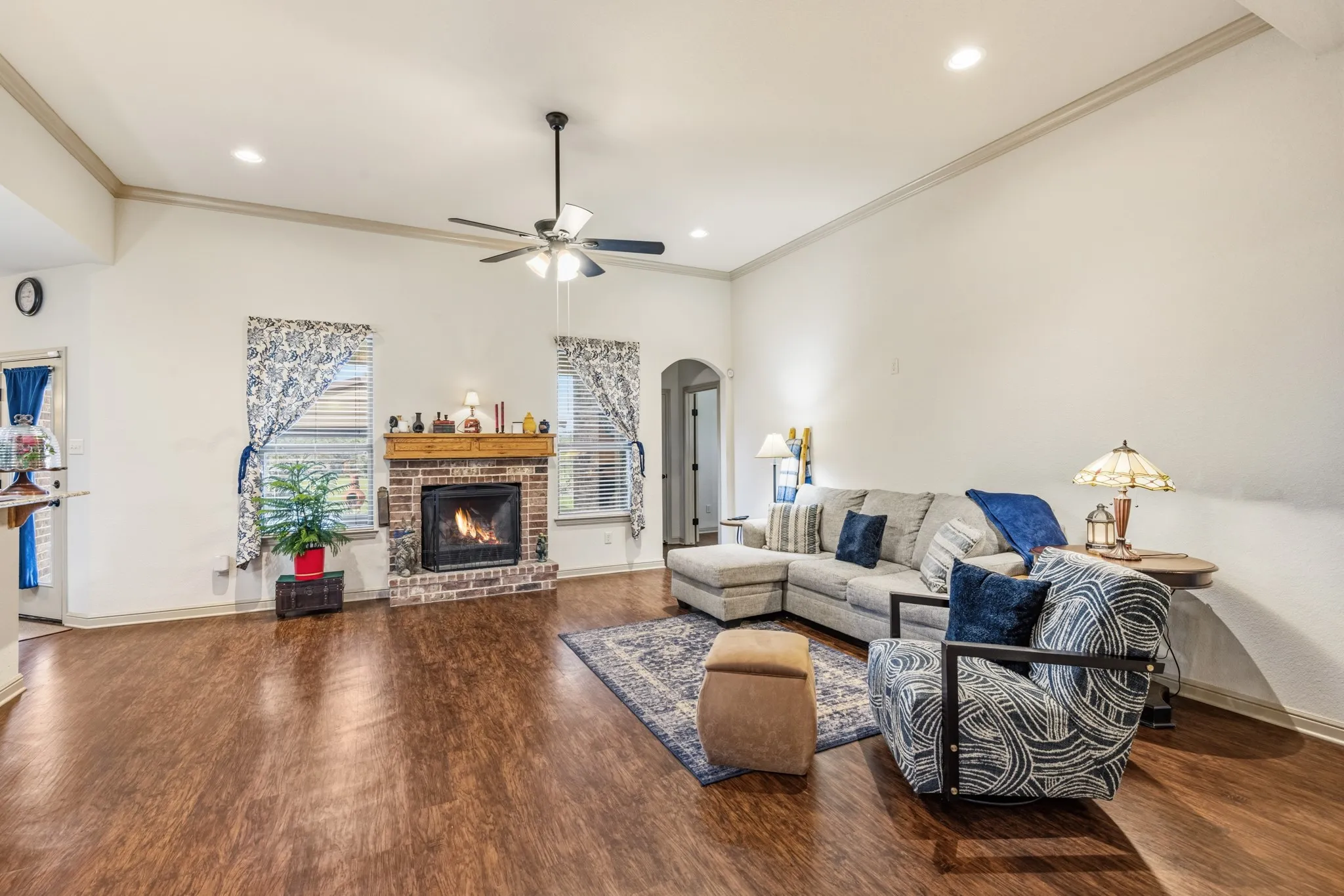 Living room has a great view of the backyard from multiple windows.